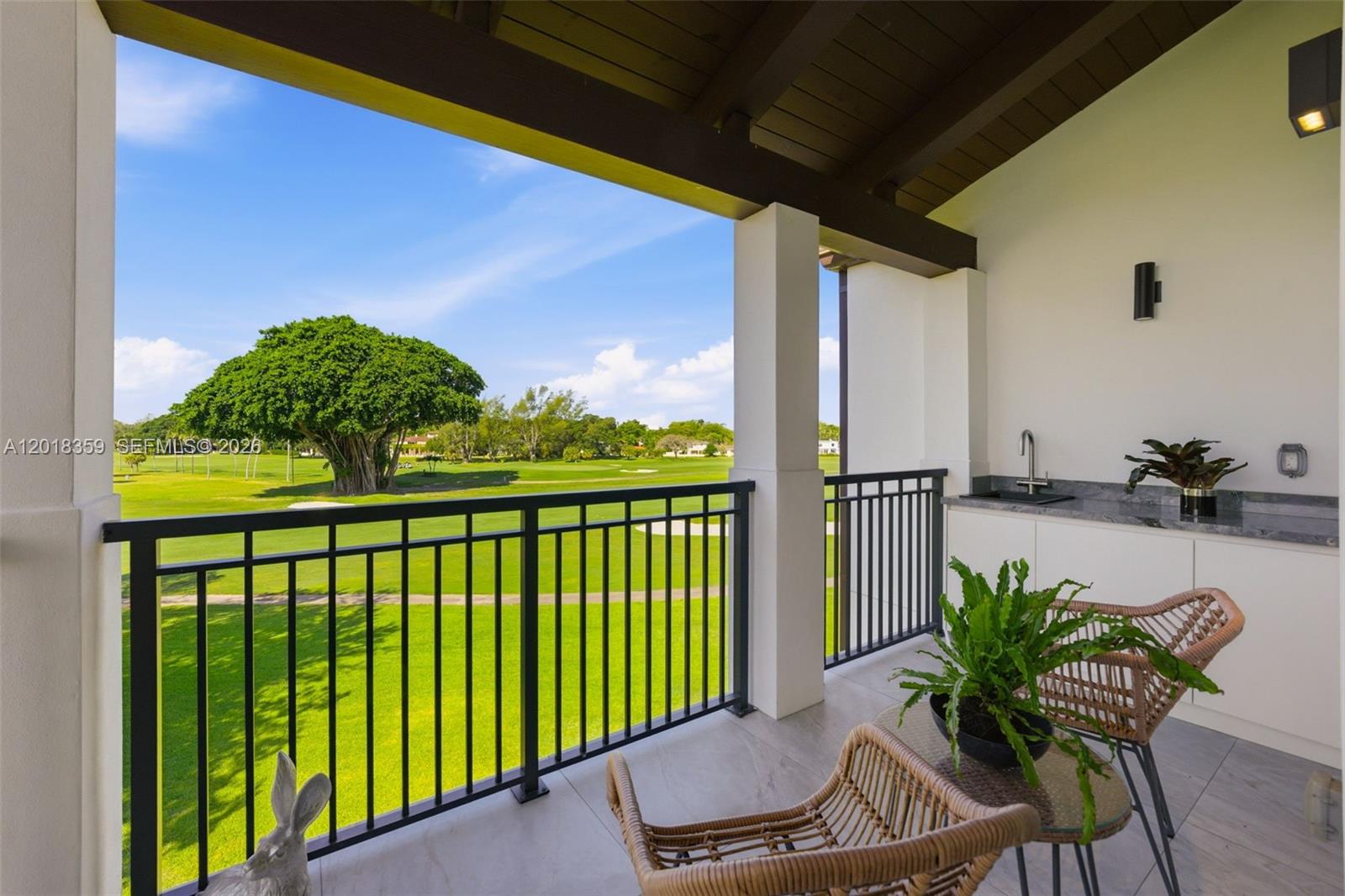Set beside the legendary Biltmore Hotel and overlooking the spectacular Biltmore Golf Course, this newly updated 3 BD, 4 BA plus den penthouse residence offers an exceptional blend of luxury, privacy, and timeless Coral Gables elegance. Built in 2021 and located within an exclusive boutique building of just 11 residences, PH304 spans 2,720 SF of refined living space and delivers the comfort of a single-family home with the ease of lock-and-leave condominium living — all within one of Coral Gables’ most prestigious residential neighborhoods. Updated within the past 1.5 years, this residence showcases sophisticated contemporary interiors, new hardwood floors, and extraordinary views from a generous balcony and large impact windows and doors. A private elevator opens directly into the home, where expansive living and dining spaces flow seamlessly for both elegant entertaining and everyday living. The custom Mia Cucina kitchen is beautifully appointed with quartz countertops, Wolf and Sub-Zero appliances and wine cooler. A striking built-in bar further elevates the entertaining experience, while spacious bedrooms offer privacy and comfort, including a luxurious primary suite with spa-like bath and generous walk-in closet. Residents enjoy a secured building with covered parking garage, serene courtyard and pool, landscaping, 3 assigned parking spaces, and storage unit.