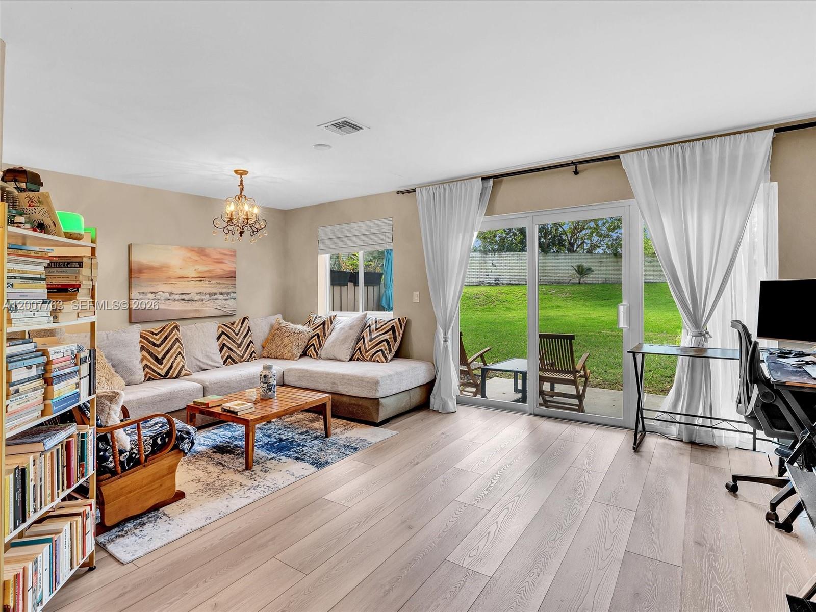 One of Discovery Pointe's most upgraded units and it shows. Move-in ready townhouse offering the rare combination of a garage, private yard, complete impact glass and low HOA in a gated community with flexible financing options, including low down payment programs.

Brand new roof in 2025. The interior was fully remodeled just a bit over three years ago and features new flooring throughout, a modern kitchen with updated finishes, and thoughtfully designed bathrooms and closets, including custom systems by The Container Store.

The primary suite offers a spacious layout with a custom walk-in closet and a well-appointed ensuite bathroom. The second bedroom also includes its own ensuite, providing privacy and flexibility for guests or multi-generational living.

Additional highlights include a full-size washer and dryer and a large, grassy backyard, ideal for outdoor living and entertaining.

Residents enjoy access to resort-style amenities, including a pool, fitness center, tennis courts, and an indoor racquetball court.

Strategically located minutes from I-95, the Turnpike, and Sawgrass Expressway, with easy access to beaches, shopping, and dining.