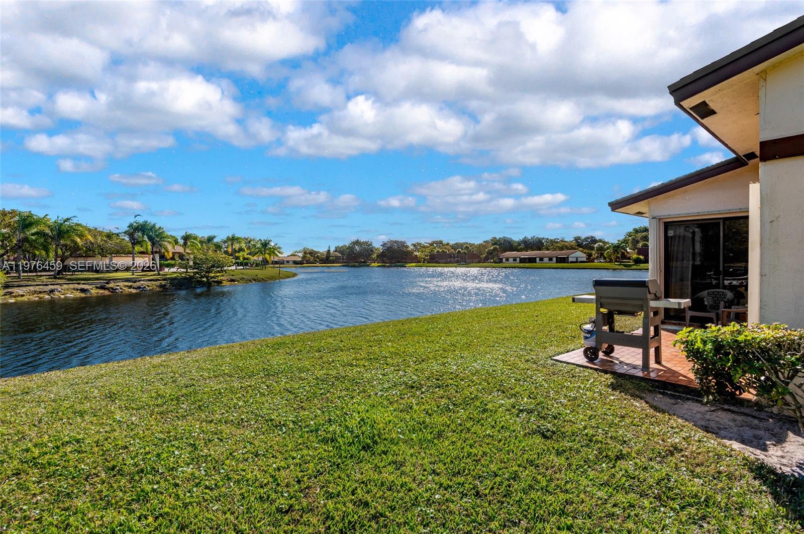 Beautiful waterfront villa located in the desirable Village at Lake Pine community. This well-maintained 3-bedroom, 2-bath residence offers 1,548 square feet of comfortable living space with a functional layout. Enjoy peaceful lake views from the private patio, perfect for relaxing or entertaining. Residents enjoy access to community amenities, including pool, clubhouse, tennis courts, and pickleball courts. Conveniently located near shopping, dining, and major highways, offering both comfort and accessibility. Low maintenance fee and same owner for the past 40 years, reflecting true pride of ownership.