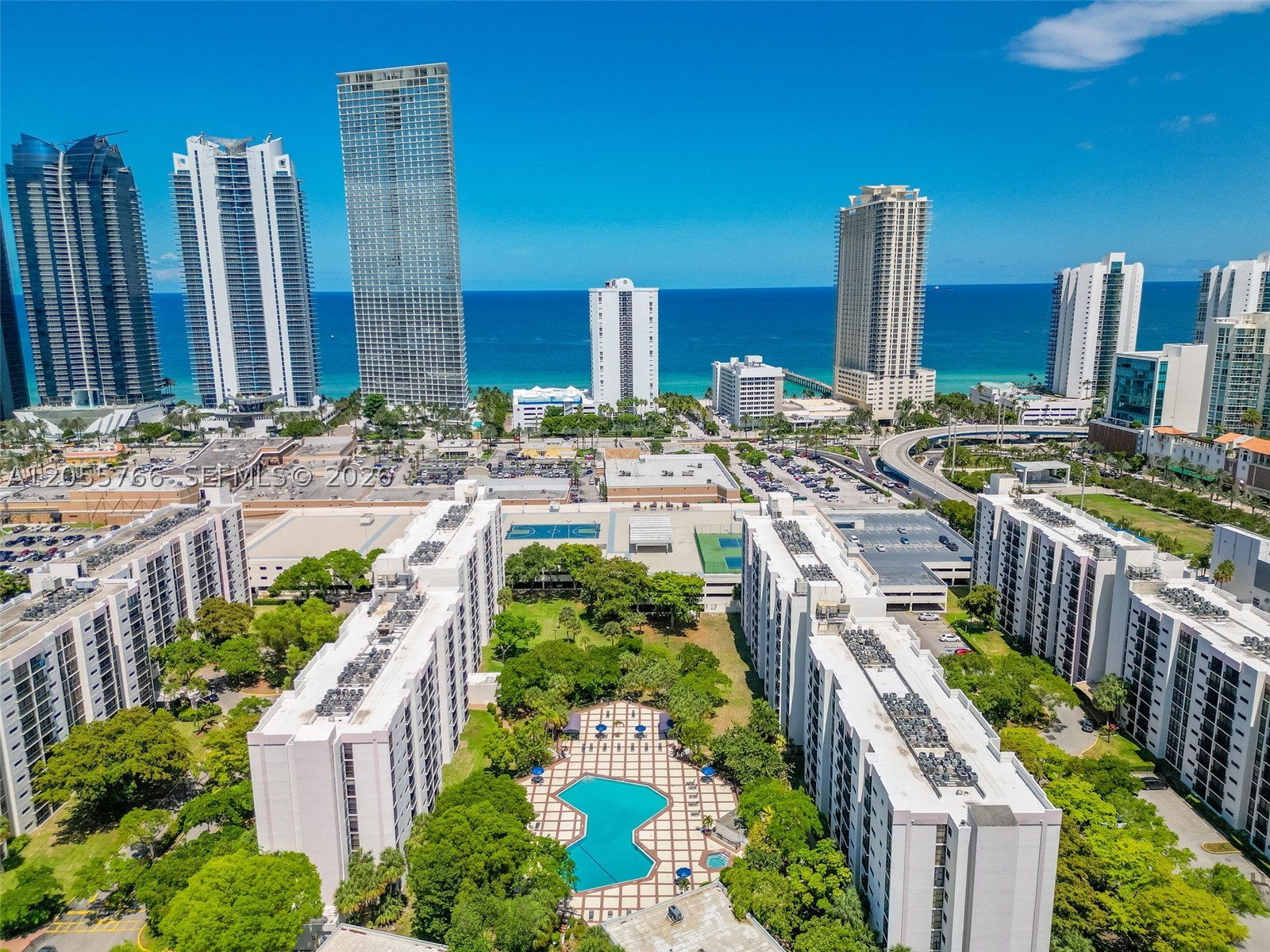 Exceptional value in the heart of Sunny Isles Beach! Move-in ready, furnished 2-bedroom + den residence in the desirable Plaza of the Americas. This bright and spacious unit features tile flooring throughout, a functional split layout, generous closet space, and a versatile den ideal for a home office or guest room. The unit is offered with practical furnishings, making it a convenient, turnkey rental.

Rent includes cable, high-speed internet, water, one assigned parking space, and an additional guest parking permit—offering outstanding value with very few comparable rentals at this price point.

Residents enjoy resort-style amenities including a swimming pool, fitness center, tennis courts, basketball court, playground, 24-hour security, and beautifully maintained grounds. Prime location just across the street from the beach and within walking distance to restaurants, shopping, parks, and public transportation. Minutes from Aventura Mall, Bal Harbour Shops, and major highways.

Available for immediate occupancy. Don’t miss this opportunity to enjoy the Sunny Isles Beach lifestyle at an unbeatable value
