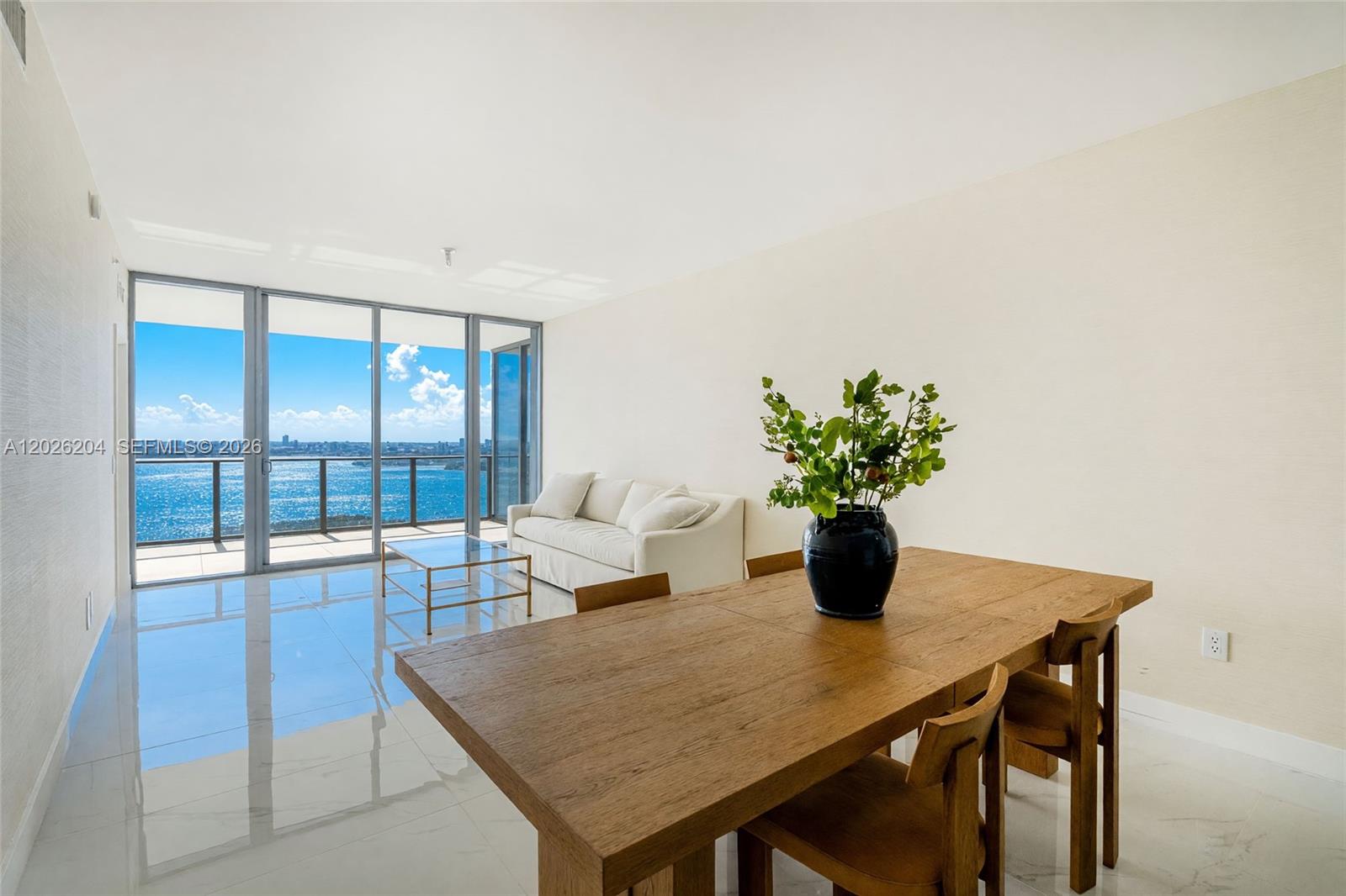 Welcome to Elevated Waterfront Living at Aria Reserve Miami, where you'll discover a rare blend of sophistication, comfort, and breathtaking views. Residence 3606 offers 3 bedrooms, 3 baths, and soaring 10-ft ceilings complemented by floor-to-ceiling glass walls that seamlessly merge indoor and outdoor living. Step onto your deep balcony and take in panoramic views of Biscayne Bay, Miami Beach, the Venetian & Star Islands, and the glittering Port of Miami.

Designed for modern elegance, the home features high-end Thermador appliances and curated finishes throughout. This residence has been tastefully designed and furnished with a keen eye for detail, and it is being offered fully furnished, making it a truly turn-key opportunity. Beyond your front door, indulge in over 2 acres of exclusive amenities: multiple pools, a full-service spa, a fitness and wellness center, basketball and tennis courts, a children's playroom, a wine cellar, and a serene waterfront park with a Baywalk. This stunning, move-in-ready unit is primed for its next owner!