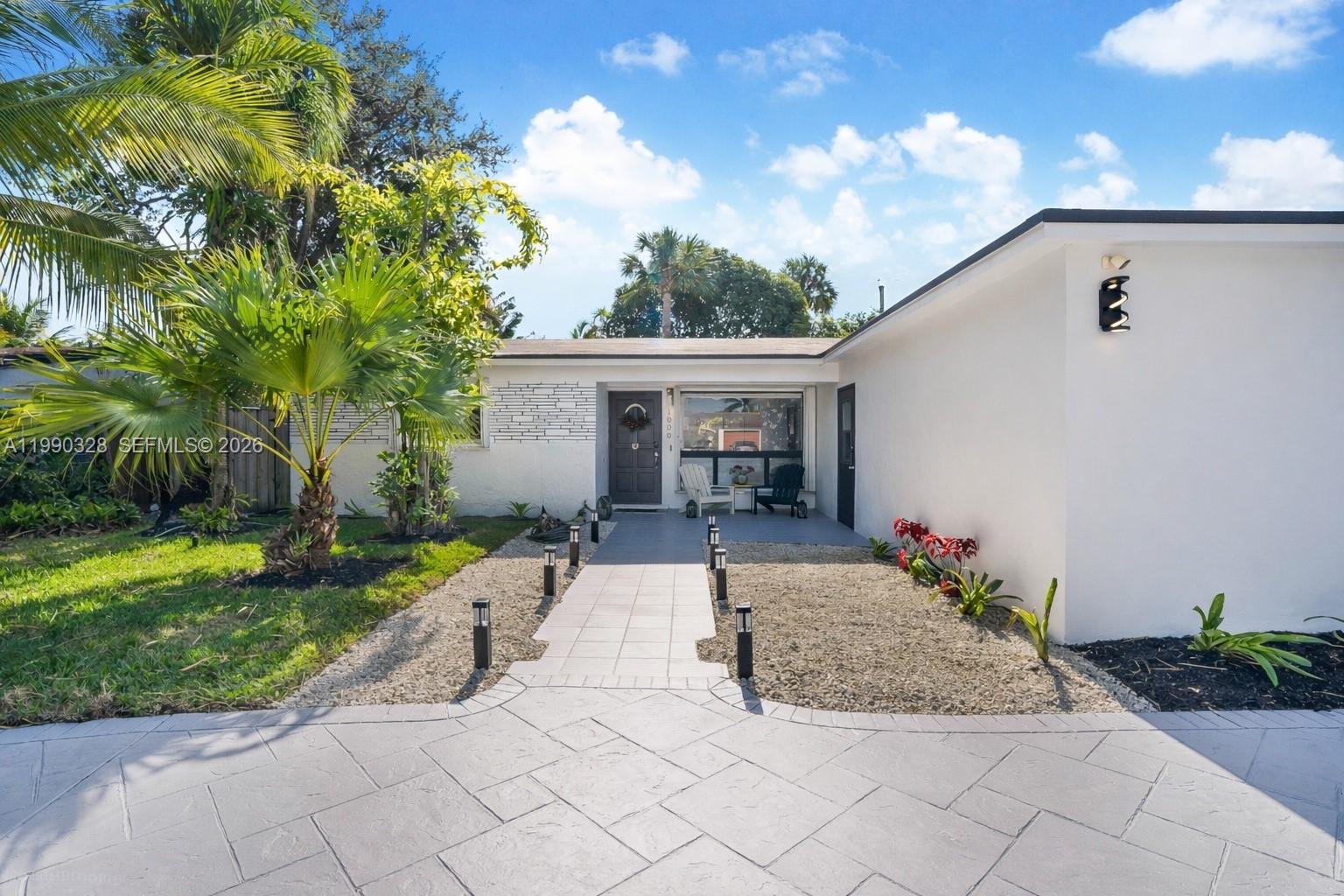 Versatile, recently renovated home in Edgewood with income potential and no HOA! This spacious 4-bedroom, 3-bathroom property sits on a large, private fenced lot with room for a pool, ample parking, and a brand-new roof.

The main residence features a desirable 3-bedroom, 2-bath split floor plan with living room, dining area, family room, and an oversized kitchen—ideal for both everyday living and entertaining.

A standout feature is the attached 1-bedroom, 1-bath suite with a private entrance and kitchenette, offering flexibility for extended family, guests, home office use, or potential rental income.

Recent upgrades include a new roof, hurricane shutters/panels, tankless water heater, and high-efficiency A/C system.

Conveniently located near major roads, shopping, dining, the airport, and Port Everglades, this property offers exceptional accessibility and versatility. A great opportunity for homeowners and investors alike—schedule your showing today!