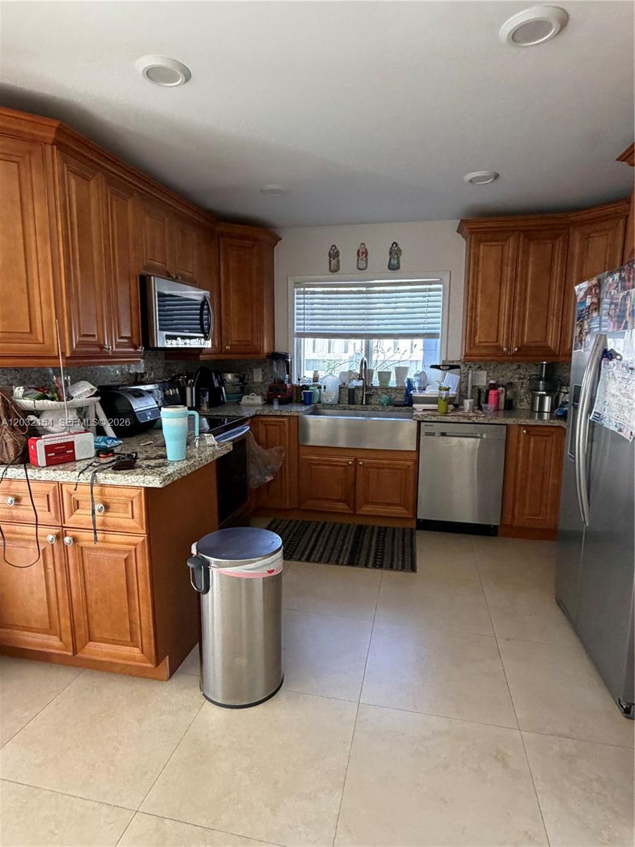 Spacious 4-bedroom, 3-bath home offering over 2,000 square feet of living space in an established Cutler Bay neighborhood. The flexible floor plan features generous living areas, ample natural light, and plenty of room for entertaining or multigenerational living. Conveniently located near schools, shopping, dining, parks, and major roadways. The property offers exceptional potential for a buyer looking to personalize and make it their own. Large backyard with space for outdoor enjoyment. Property is being sold As-Is with the right to inspect. Don't miss this opportunity to own a well-sized home in a desirable location! 24 hr. advance notice for showing time needed! No exceptions! Please schedule through showing request. Thank you