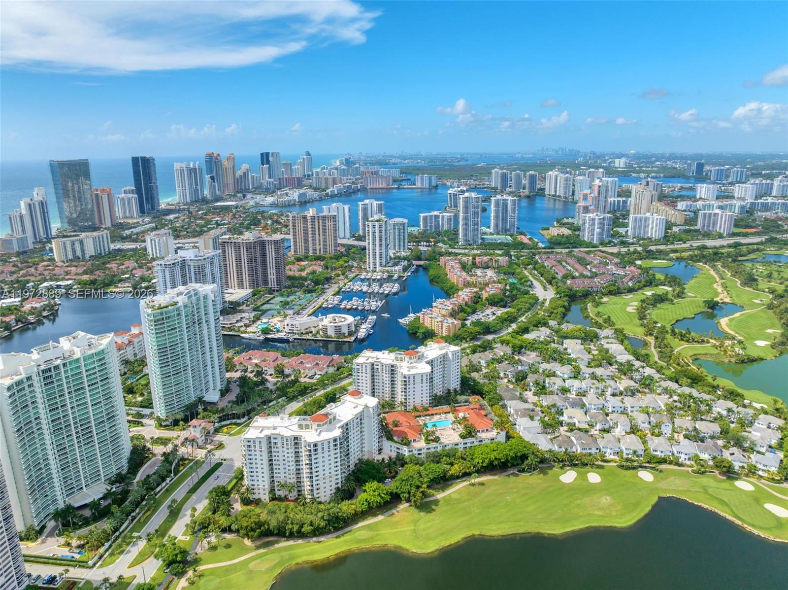 Residence 714 in the North Tower at Turnberry Village offers an exceptional opportunity to enjoy a full-service luxury lifestyle in one of Aventura’s most established and amenity-rich communities.
This bright, north-facing residence is filled with beautiful natural light and features open views overlooking the Turnberry golf course, tranquil water features, and select ocean views, creating a sense of space and serenity rarely found at this price point.
Turnberry Village is known for its expansive resort-style amenities, including a beautifully appointed clubhouse, pool and spa, sauna, state-of-the-art fitness center, billiard room, business center, concierge services, valet, 24-hour security, a dedicated children’s playground and an on-site house of worship for residents. The community’s scale, finishes, and services rival those of significantly higher-priced buildings.
Just outside the gates is Country Club Drive, Aventura’s iconic three-mile circular walking, jogging, and biking path, offering an active, outdoor lifestyle that residents enjoy year-round.
Ideally located in the heart of Aventura, minutes from Aventura Mall, beaches, parks, dining, houses of worship, and major roadways, Unit 714 represents a rare combination of light, views, amenities, and long-term value in a premier location.