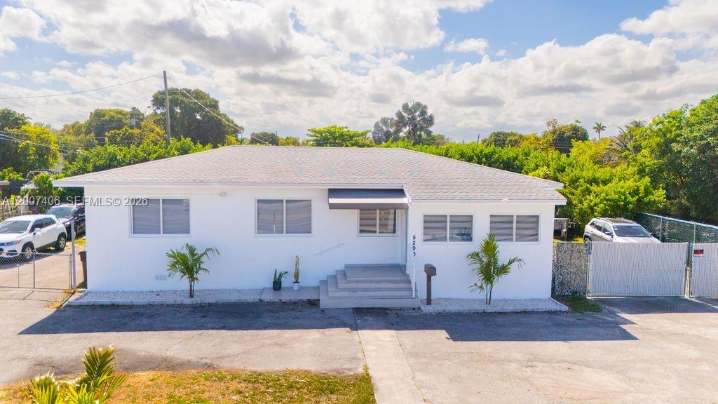 Beautifully fully remodeled 3-bedroom, 2-bath corner home with no side neighbor. This property has been completely updated with modern finishes throughout, offering both style and comfort. Enjoy outdoor living at its finest with a fully equipped outdoor kitchen, ideal for entertaining, an exceptional opportunity you don't want to miss! Property must be purchased with 2900 sq ft lot next door Folio:04-2131-030-0040.