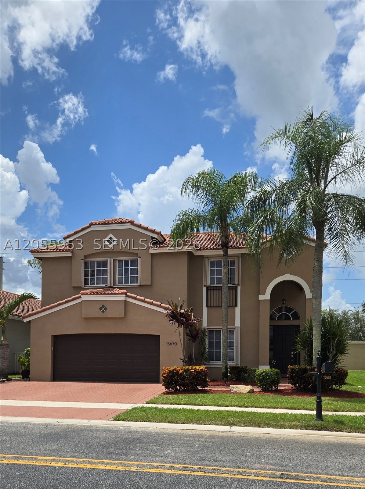 WONDERFUL AND RARELY AVAILABLE GRAND BAY MODEL FEATURES A SPACIOUS 4 BEDROOM 2.5 BATH HOME IN GRAND PALMS GOLF AND COUNTRY CLUB. THE HOME FEATURES A FIRST FLOOR MAIN SUITE WITH ADDITIONAL 3 BEDROOMS UPSTAIRS WITH A LARGE LOFT AREA.  EXPANSIVE 2 STORY CEILINGS THROUGHOUT THE HOME. NEW ROOF 2021, NEW A/C(5 TON) 2022. REMODELED BATHROOMS AND KITCHEN. BONUS PERMITTED GARAGE CONVERSION ADDS 300SQ FT OF LIVING AREA, WITH OPERATIONAL IMPACT GARAGE DOOR AND STORAGE AREA. OUTSIDE FEATURES INCLUDE AN EXPANDED 3 CAR DRIVEWAY, EXTENDED LARGE PATIO IN THE FENCED BACK YARD WITH PLENTY OF ROOM FOR A POOL. COMPLETE HURRICANE PROTECTION. GRAND PALMS/GROVE ESTATES HOA INCLUDES COMPLETE LAWN CARE, SPRINKLERS, CABLE,INTERNET, WIFI, MAILBOXES,PALM TREE TRIMMING, MANNED GUARD GATE, ROVING PATROL,SECURITY ALARM WITH ADT MONITORING AND A NEW CONVIENENT BACK GATE, FOR MAINTENCE FREE LIVING.