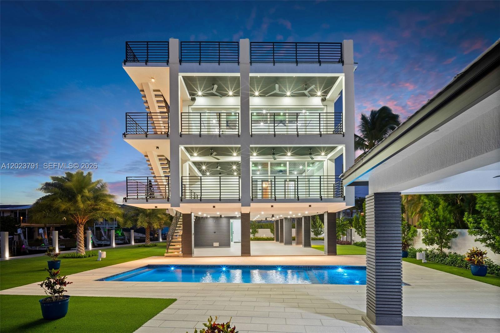 Experience luxury waterfront living in the Florida Keys with this exceptional estate, ideally located at the end of a quiet street. Boasting 173 feet of deep-water dockage and a large turning basin, it easily accommodates yachts, sportfishing boats, and high-performance vessels.

This 5-bedroom, 4-bathroom smart home blends elegance with durability, featuring high-end interior finishes and premium composite wood exteriors designed for the coastal environment. Inside, enjoy a private elevator, whole-home surround sound, and smart technology with programmable hubs in every room. Audio flows seamlessly throughout the home, pool area, and rooftop deck.

Designed for convenience, the home includes two laundry rooms and a chef’s kitchen equipped with top-tier Thermador appliances. Spacious interiors open to a private outdoor retreat with a resort-style pool, sun shelf, gazebo, and expansive balconies offering stunning bay views and unforgettable sunsets near Toilet Seat Cut.

The nearly 2,000 sq ft rooftop terrace is a standout feature, complete with turf, bar, BBQ area, and panoramic views, perfect for entertaining. With direct bay access and a short ride to Tavernier Creek, reaching the Atlantic Ocean is quick and easy.

Owner financing available.