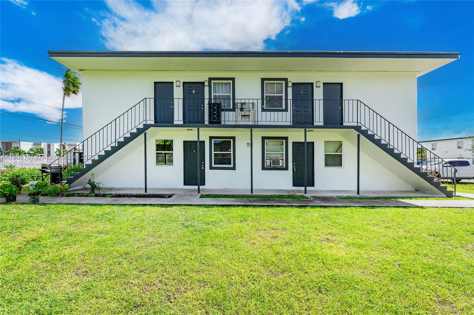 Investment Opportunity-Fourplex centrally located and income producing property! This fourplex features four units, each offering 2 bedroom 1 bath and spacious kitchen. Conveniently located near shopping, dining and major highways, this property offers excellent rental potential and long term value for investors.