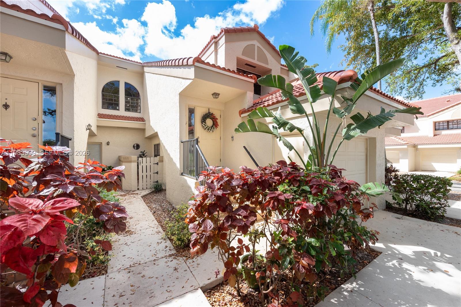 This beautifully renovated townhouse offers an excellent layout in a single-story unit. A few easy steps lead to the entrance, where you are welcomed by abundant natural light. The social areas feature an open-concept design, seamlessly integrating the living room, kitchen, dining area, and balcony, perfect for entertaining. The kitchen is thoughtfully designed, modern, and spacious, with stainless steel appliances and a sliding door that opens to the balcony.

The home offers three well-sized bedrooms. The primary suite includes a walk-in closet, access to the balcony, and a generously sized bathroom. The additional bedrooms enjoy a beautiful lake view, as the home is ideally positioned facing the water. The second bathroom has been completely updated.

The laundry area is conveniently located and can be easily concealed by closing two doors. It includes a large washer and dryer. The property comes with one covered parking space and an additional driveway parking spot.

The neighborhood features a pool area and a large, beautiful park directly across the street. It is also within walking distance to the synagogue, with three nearby. Conveniently close to I-95, yet without highway noise—this location is truly fabulous.

HOA includes access to the pool, water, cable, internet, insurance, common area maintenance.