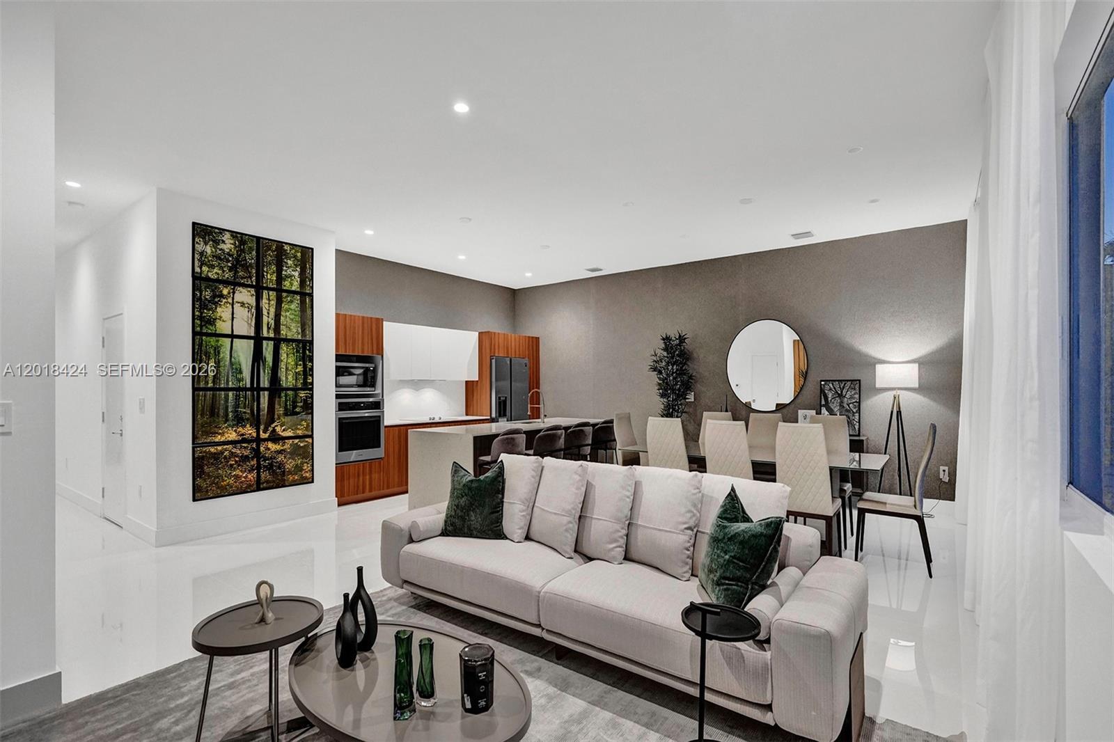 Located just east of Fort Lauderdale, Galleria Villages presents an exclusive collection of 24 brand-new residences. Thoughtfully designed with privacy and security in mind, this gated community offers a peaceful retreat for you and your family. Each home includes the option for a private pool, charming front yards ideal for barbecues and gatherings, and an inviting atmosphere for creating lasting memories. The contemporary open-concept layout features 10-foot ceilings, a two-car garage with automated doors, three en-suite bedrooms, a guest bathroom, a versatile den, and sleek stainless steel appliances. Don’t miss the chance to secure your home in this pre-construction development, with expected completion in Q2 2026.