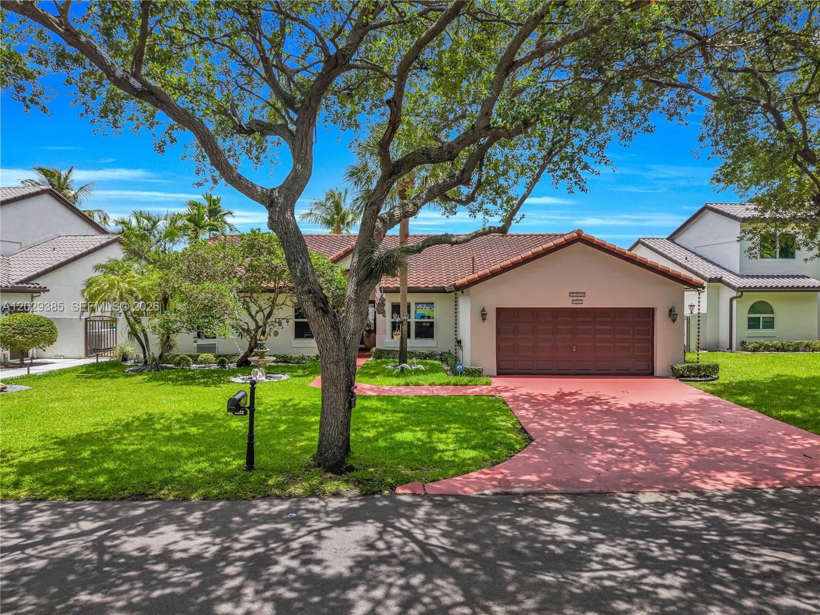 Welcome to your dream home. This beautiful, fully remodeled three-bedroom, two-bath lakefront single-family residence combines comfort and style. This meticulously maintained home features high-impact windows and doors, giving you peace of mind, along with a roof that is only 8 years old.

You'll find a stunning upgraded kitchen with stylish stainless-steel appliances and modern finishes, along with beautifully remodeled bathrooms designed with both elegance and functionality in mind.

The open-concept layout is filled with natural light and expansive water views, allowing you to enjoy breathtaking views of the lake. The backyard is perfect for entertaining, featuring a spacious lot and a private saltwater pool equipped with a natural gas heater for year-round enjoyment.

This home is highly energy-efficient and cost-effective, operating primarily on natural gas for the range, water heater, pool heater, and clothes dryer.

Located within a fully gated community with 24-hour security, the property provides immediate access to I-75 and the Florida Turnpike.