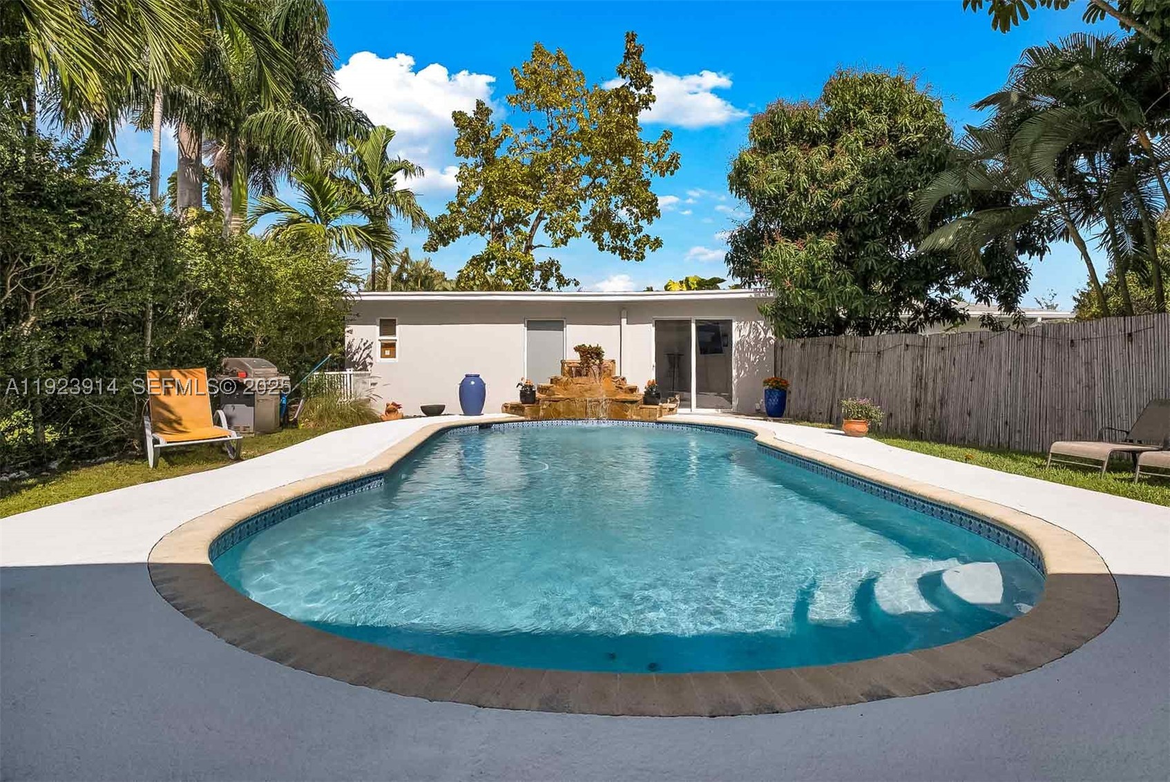 Bright, beautifully updated, and exceptionally versatile 3BR/2BA home offering the perfect blend of comfort, functionality, and long-term value. The spacious interior features an open, flowing layout with a renovated kitchen, updated baths, expansive living areas, and elegant tile and marble flooring throughout. A detached structure provides outstanding flexibility as a home office, fitness studio, art studio, guest retreat, or creative workspace, with excellent future value-add potential. Outdoor living is equally inviting with a covered patio overlooking the sparkling pool and a private, fenced backyard designed for relaxing or entertaining. Additional highlights include a full 2-car garage, ample parking, impact windows, and an oversized walk-in laundry room with generous pantry/storage space rarely found in homes of this size. Ideally located just north of Miami Shores, moments from neighborhood cafés, restaurants, parks, and shopping. An exceptional opportunity for both owner-occupants and investors seeking strong rental appeal and long-term appreciation. Images may be virtually staged and/or digitally enhanced (including furniture, colors, fixtures, and landscaping) for illustrative purposes only.