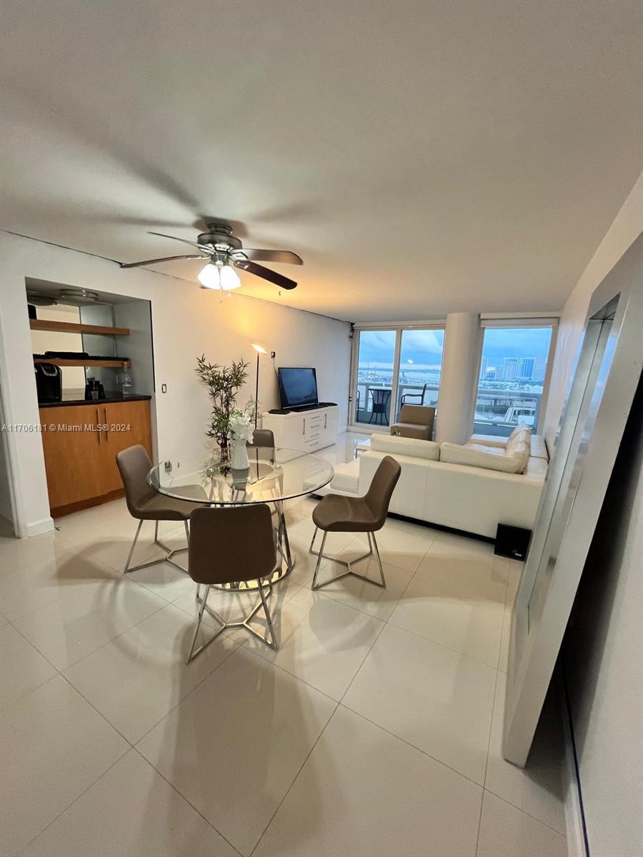 Step into luxury with this stunning unit boasting breathtaking views of the Miami skyline and Biscayne Bay. This fully furnished residence features a newly renovated kitchen, sleek porcelain floors, and has been freshly painted. The unit comes equipped with flat-screen TVs and a convenient washer/dryer.
The building offers an array of amenities including 24-hour concierge and security services, restaurants, salons, retail stores, a food market, a liquor store, a pharmacy, a pool, a gym, and more. Enjoy easy access to public transportation and proximity to vibrant neighborhoods like Brickell, Midtown, the Design District, Wynwood, and Miami Beach.

Perfect for those who value both comfort and style.