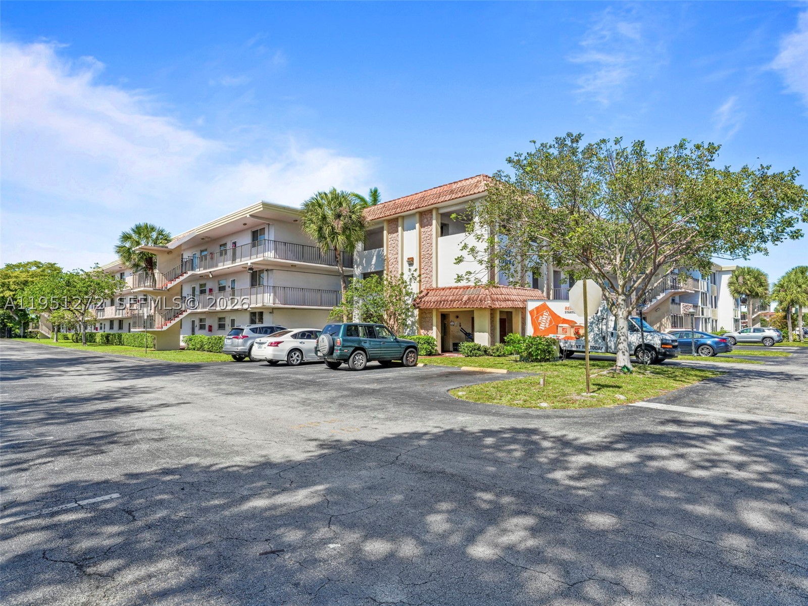 Welcome to your dream home in the Water Bridge community! A bright great living room opens to a private screened balcony with Hurricane-Impact windows and doors for peace of mind, perfect for morning coffee. Split bedrooms for privacy. Community amenities include a clubhouse, pool, library, BBQ area, shuffleboard, and elevators. Prime location close to shopping, dining, main avenues and major highways. Too much to mention. Some images in this listing have been virtually staged.