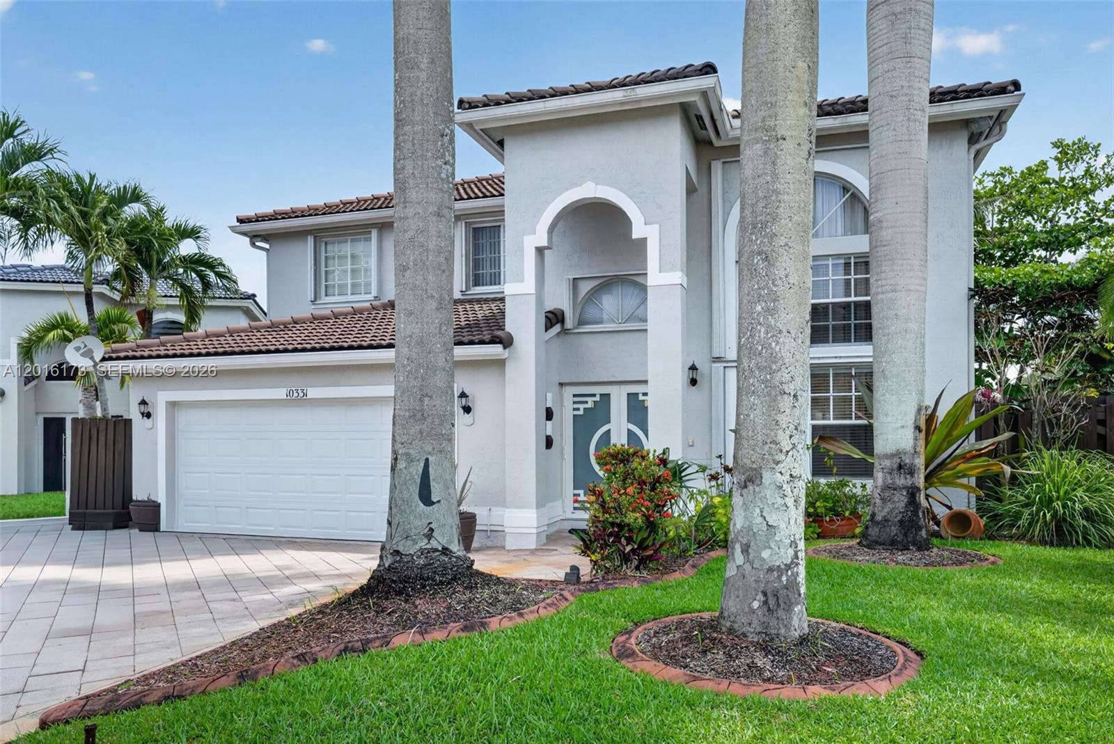 This 5-bedroom, 3-bathroom two-story home in Forest Lakes offers a blend of soaring cathedral ceilings and a private, open-air pool lifestyle designed for entertaining. The property is thoroughly move-in ready with significant recent upgrades, including a brand new 2026  A/C system, a brand-new pool pump, impact-protected doors, and a freshly painted exterior. Inside, the home features a renovated primary shower and guest bath, with tile and laminate flooring throughout the main living areas. A versatile garage conversion currently serves as an office or gym, though the seller is willing to remove it prior to closing to restore full garage parking. Situated on a quiet street with a low $155 monthly HOA fee, the home provides easy access to the Turnpike, Baptist Hospital, and top-rated schools