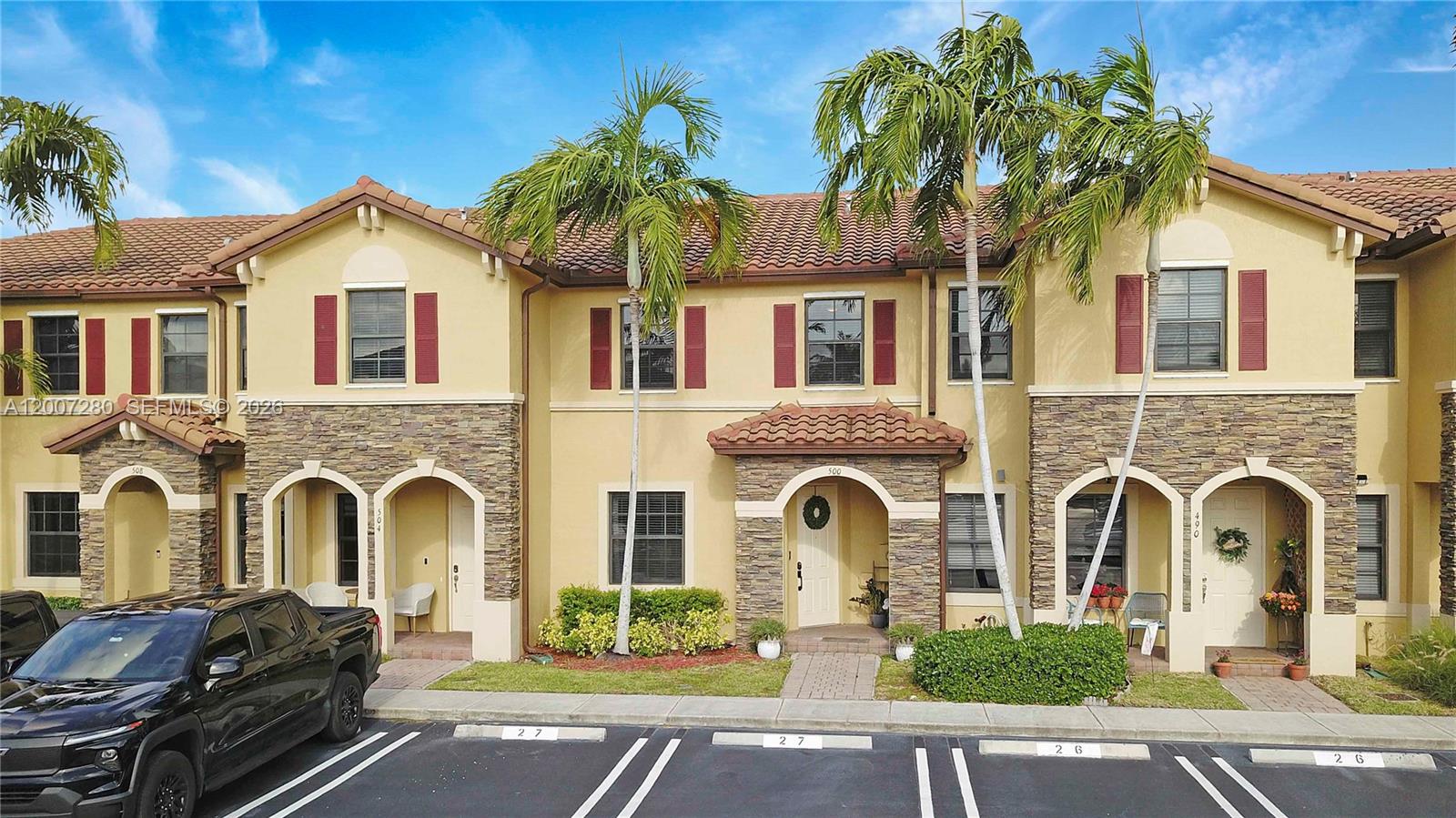 Beautifully updated home in Homestead offering modern finishes and serene lake views. The renovated kitchen is tastefully designed with sleek quartz countertops and stainless steel appliances including washer & dryer, ideal for both everyday living and entertaining. Stairs and the entire second floor have been upgraded with stylish and durable luxury vinyl flooring, while updated light fixtures and hardware throughout add a clean, modern touch. Enjoy peaceful lake views from your living space along with the convenience of additional outdoor storage. Located in a well-maintained community with very low HOA, residents benefit from an electric gated entrance, access to a community pool and clubhouse, and 2 designated parking spots, providing both comfort and value.