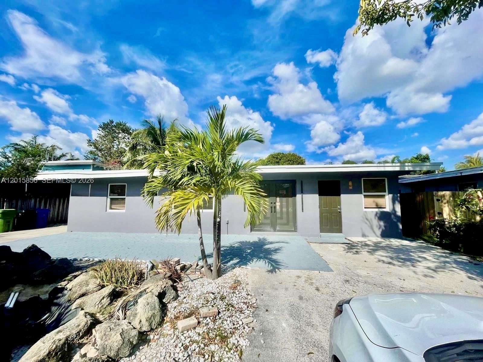 Beautifully updated 5-bedroom, 3-bath pool home, with no HOA, located in one of Fort Lauderdale’s most desirable and rapidly growing neighborhoods, just minutes from the beach, Wilton Manors, Las Olas, and Downtown Fort Lauderdale. Positioned on a quiet residential street, this property offers the perfect blend of lifestyle, location, and flexibility. The home features a modern open-concept layout with porcelain tile flooring throughout, impact windows and doors, updated bathrooms, and a spacious kitchen equipped with stainless steel appliances. Designed for both everyday living and entertaining, the backyard offers a private pool and outdoor space ideal for enjoying the South Florida lifestyle. A standout feature of the property is the separate private efficiency, offering flexibility for extended family, guests, a home office, or potential future rental income opportunities. Located near some of Fort Lauderdale’s top dining, shopping, nightlife, beaches, and entertainment destinations, this home also presents strong long-term value in an area experiencing continued growth and redevelopment. Offered at $947,000, this property is competitively priced relative to recent neighborhood sales and updated homes in the surrounding area.