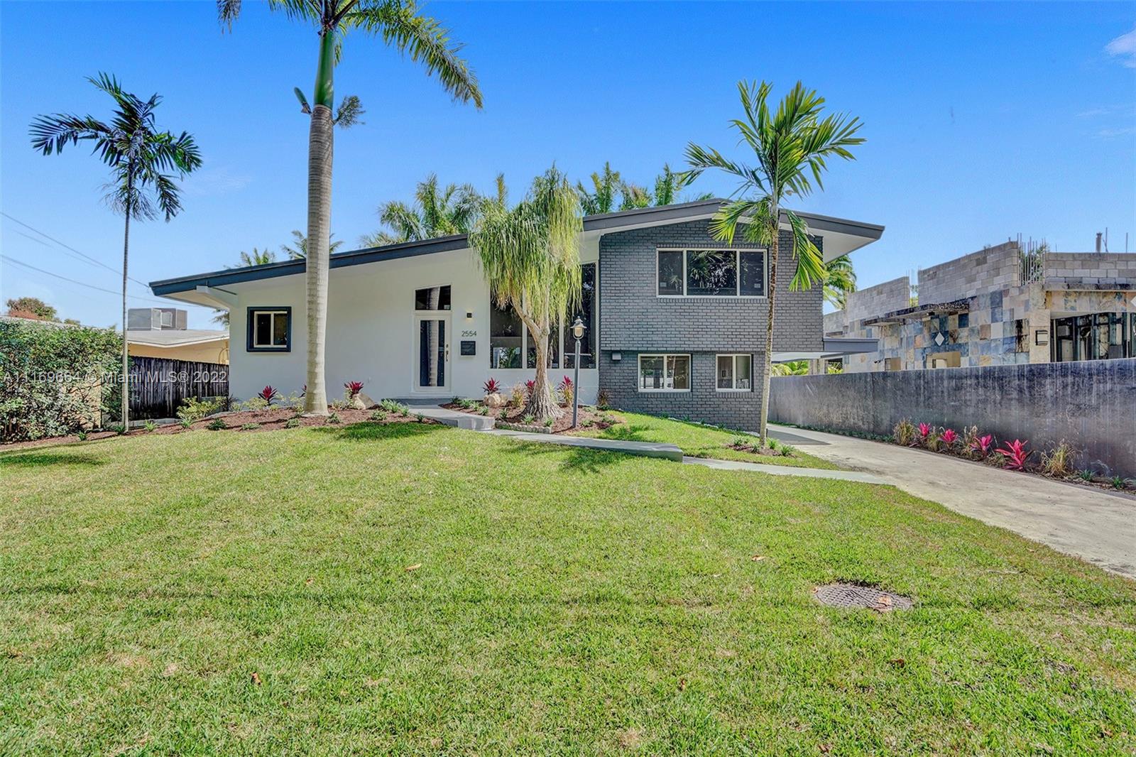 No expense spared in Lauderdale Isles! Fabulous 3/2 tri-level home sits on 65’ ocean access canal w/no fixed bridges. 5-miles to the ocean! Approx 40' dock. Brand new kitchen, white shaker style cabinets in Birch w/soft close/full extension glides. Subway tile backsplash & 1” Quartz countertops, brand new Samsung appliances! 2-zone A/C units brand new (Trane). remodeled bathrooms w/vanities made in Spain. New water heater. Caravel waterproof SPC vinyl flooring. Impact windows/doors. New interior doors/baseboards. Exterior boasts: brand-new deck off upstairs BR, new pavers, sod, freshly painted dock & exterior in Frosted Jade & grey. Ample room for a pool! No HOA! No pet restrictions! Minutes from I-95, 595, Turnpike, FLL Airport, Beach, dining + more! Just bring your toothbrush!