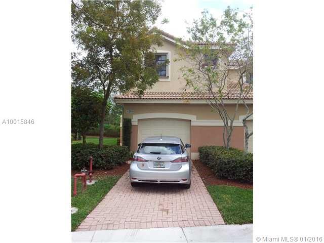 Beauty Townhome with tile and wood floors, no carpet, upgraded granite tops in kitchen, S.Steel appliances, private backyard, no townhomes behind. NEWER A/C efficiency $$$!! Association approval required up to 30 days for app. Community pool, next to the Weston Public Library, AA Middle & High schools... Hurry!!