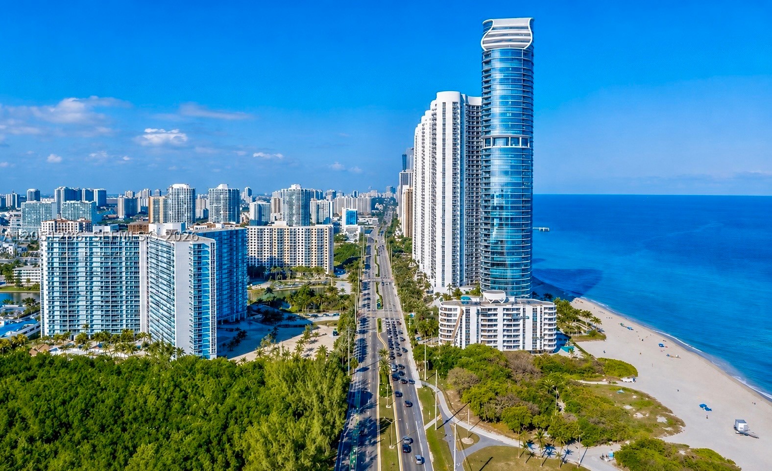 Turnkey, fully furnished investment opportunity with immediate rental income. Modern 2-bedroom, 2-bath residence in Arlen House East offering 1,331 SF of spacious interior living. Floor-to-ceiling impact windows and doors fill the home with natural light while showcasing beautiful Intracoastal, Atlantic Ocean, and city views. Enjoy breathtaking sunrises and ocean breezes from your private balcony with ocean-facing views. Features include contemporary furnishings, newer A/C system with hydro handler, spacious walk-in closets, assigned parking, and valet service available. Resort-style amenities include a heated pool, fitness center, tennis courts, concierge, on-site café, marina access, and 24-hour security. Ideally located in the heart of Sunny Isles Beach near shopping, dining, houses of worship, and major roadways. Excellent opportunity for investors or future owners. Currently leased through 03/01/2027 at $3,100 per month with no automatic renewal option, providing immediate income with future flexibility for owner occupancy or continued investment use.