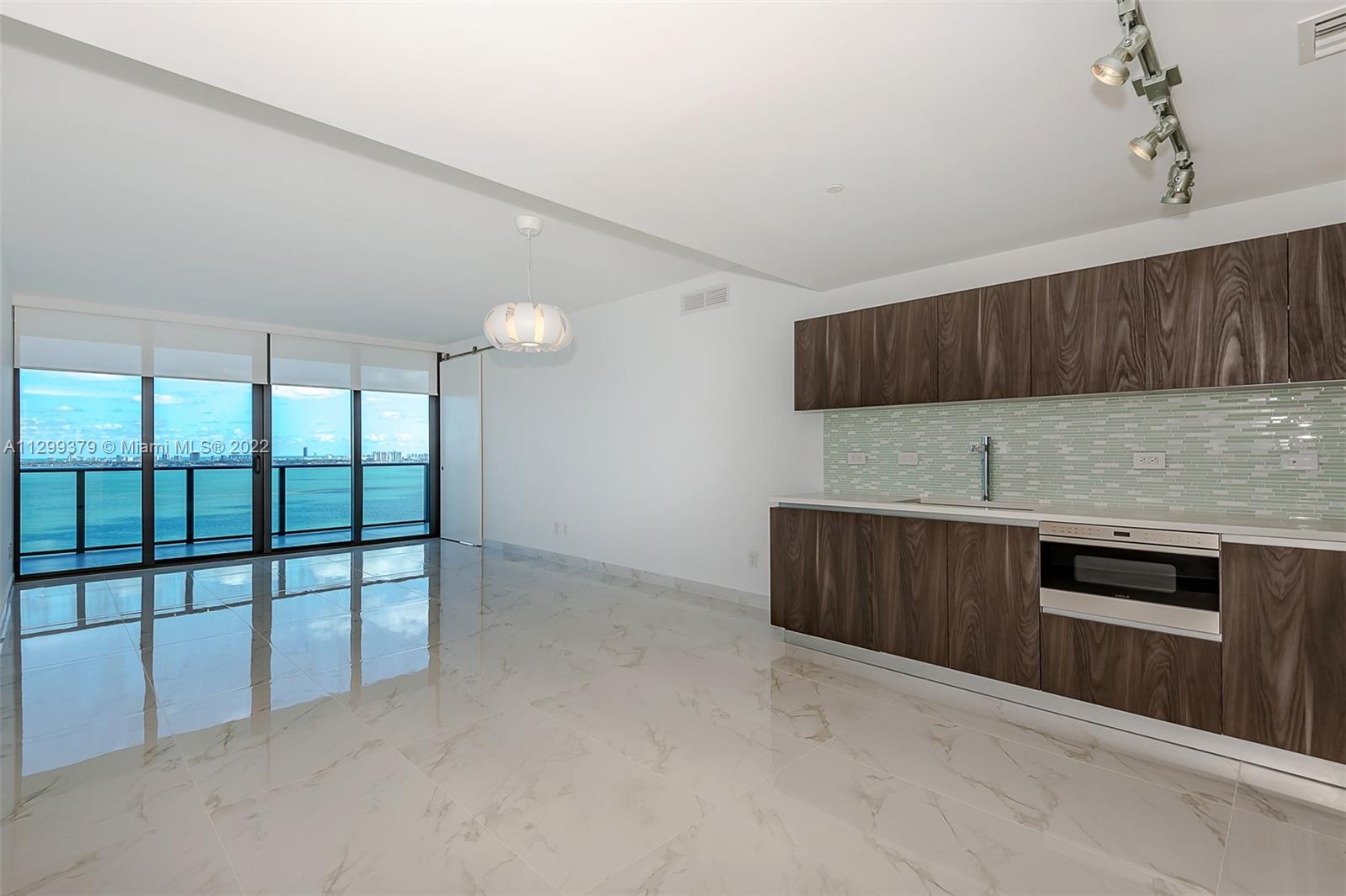 Stunning 3 beds/3.5 baths PLUS den. STORAGE INCLUDED.  Beautiful views, open concept, modern floor pan, private elevator and foyer, 9-10' ceiling, floor to ceiling windows throughout, sophisticated kitchen with European cabinetry, Zero/Wolf appliances, elegant bathrooms, huge balconies. Motorized blinds (only few units have it). Great customized closets. 5 star amenities, deluxe fitness center, spa with sauna/steam and massage services, theater, business center, kids room. 1 assigned parking space plus valet. A refundable security deposit equal to one month rent is required by the association.