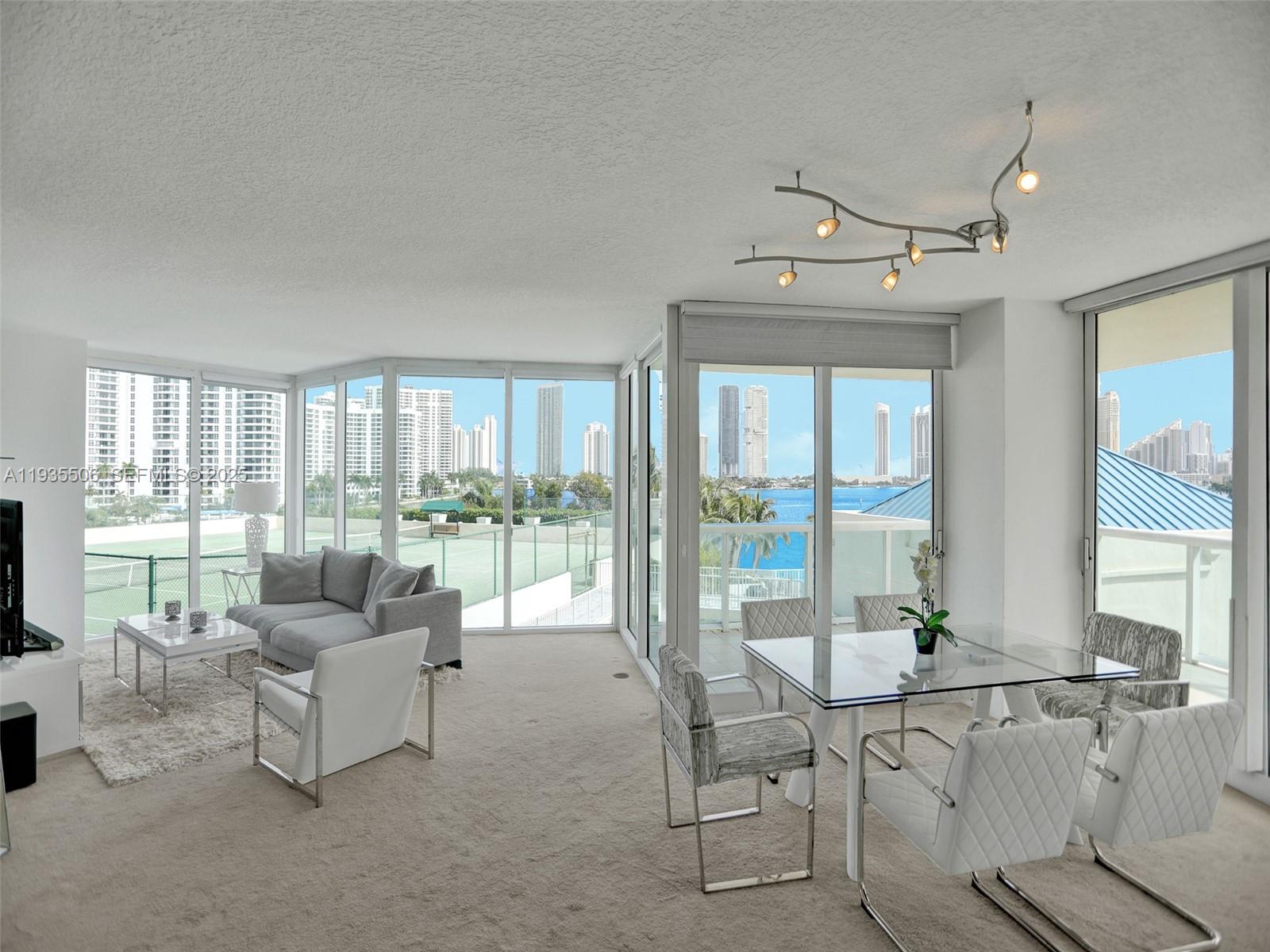 Wow! Enter This Rarely Available And Most Desirable F-08 Model. Through Semi Private Elevator Foyer And See Sparkling Intracoastal Views. Spacious 3 Bedroom 3.5 Baths And Large Den Or 4th Bedroom And Utility Room. Excellent Split Floor Plan Affords Lots Of Privacy For The Large Primary Bedroom. The Finest Finishes And Upgrades, Floor To Ceiling Windows, Custom Lighting And More. 5 Star Amenities Include: 2 Story Spa, Pools, Tennis Courts, Gym, Private 65' Marina, Private Park, Valet, Security, Covered Parking Space, & Much More.