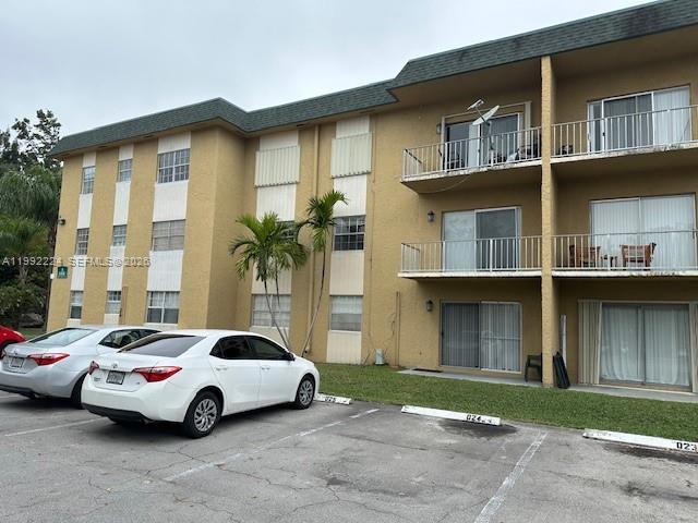 Move-in ready! Spacious 2 bedrooms, 1 bath located in the beautiful community of Miller Lake Condo Association. Beautiful wood floors in living area, tile floors in bedrooms, kitchen with full appliances and breakfast bar area. Located close to shopping, schools and transportation.