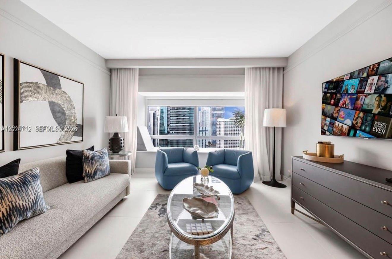 Remodeled 1 Bedroom | 1.5 Bath Executive Residence with stunning city views at the prestigious Four Seasons. Designed by Arterfacto and curated for elevated luxury living.

Enjoy full access to world class amenities including:

3 resort-style pools
Jacuzzi
Equinox Fitness Club
Business center
Signature restaurant
24 hour room service
Concierge & valet services
Residence includes:

1 parking space
1 private storage unit
The Four Seasons Hotel & Tower represents the pinnacle of five star living and personalized service in Miami.

Excellent income producing opportunity generating over $15,000/month during high season.

Unit currently occupied.
48 hour notice required for showings.