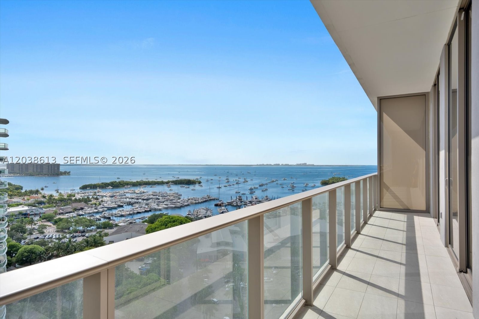 Experience elevated living at Mr. C Residences Coconut Grove in this sophisticated 2-bedroom, 2.5-bath residence offering 1,134 total square feet and soaring 10-foot floor-to-ceiling windows that bring in abundant natural light with ocean and bay views. Thoughtfully designed with a desirable split-bedroom floor plan, the home features European porcelain flooring, quartz countertops, Italian terrazzo details, a sleek contemporary kitchen, and spa-inspired bathrooms. Solid core wood doors and refined finishes throughout showcase the exceptional quality and craftsmanship synonymous with Mr. C. Residents enjoy an unparalleled lifestyle with resort-style pools, state-of-the-art fitness facilities, butler service, a full-service bar, and access to world-class amenities, all ideally situated in the heart of Coconut Grove. Offered furnished, with private storage space included.