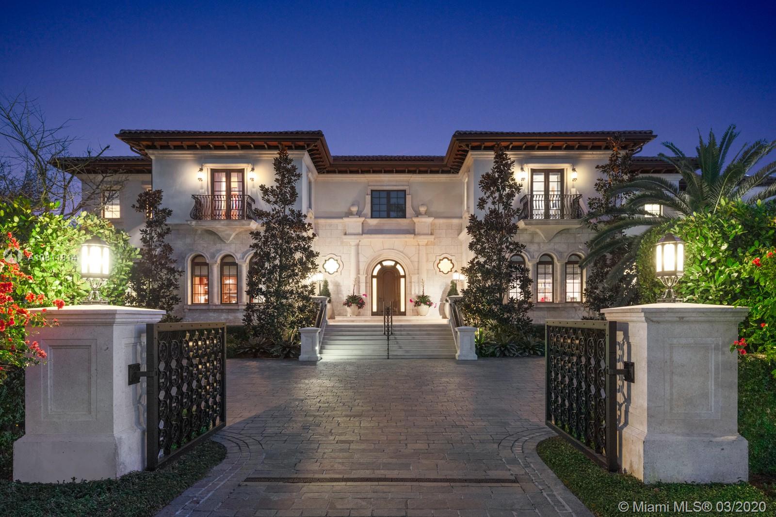Located on the water’s edge in Gables Estates on a 42,253 sf lot facing a wide lagoon with direct bay access, this luxurious 15,522 total sf, 5BR/7+3BA palladian waterfront villa comes with picturesque views from several sitting areas. Downstairs are the formal living room, dining room, gourmet kitchen, breakfast room, family room with wet bar, and billiards room with a second bar, all with custom Venini glass lighting. The kitchen comes with a hidden butler’s kitchen and walk-in wine cellar for an equally impressive collection. Two home offices can be converted into additional bedrooms, and secret storage spaces are scattered throughout. Summer kitchen, saltwater heated pool, 180 ft dock with boatlift and ideal water features enhance this inviting home for both entertaining and leisure.