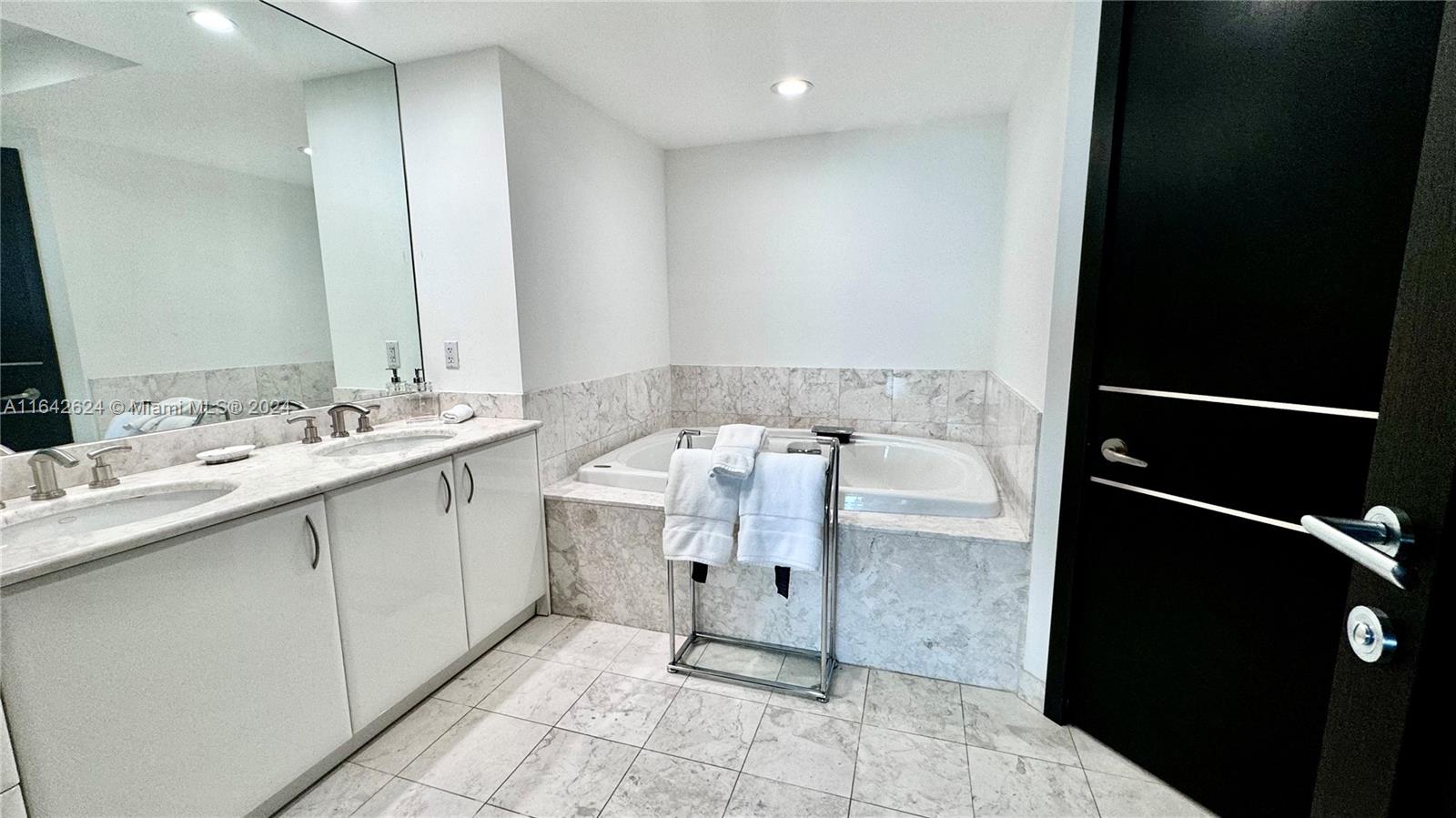 JADE RESIDENCES AT BRICKE - Residential