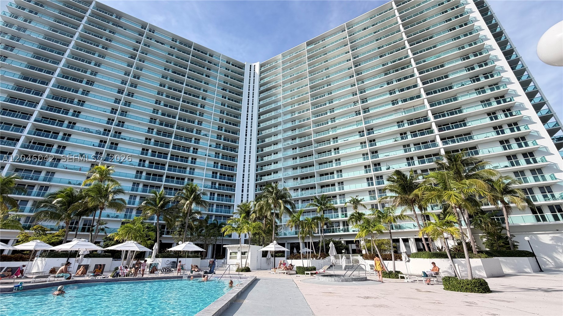 Ocean-view residence with a large balcony offering a pleasant ocean outlook. Ideally located directly across the street from the beach in the heart of Sunny Isles Beach.

The unit features impact floor-to-ceiling windows and sliding glass doors, stainless steel appliances, and high-speed internet and cable included in the maintenance fee.

Residents enjoy an outstanding amenity package including a recently remodeled lobby, two new fitness centers, pool, jacuzzi, tennis courts, on-site restaurant, marina, and available dock spaces. Assigned parking space plus full-service valet parking and 24/7 security provide convenience and peace of mind.

Located within the highly rated Sunny Isles school district and just steps from Haulover Park, with Bal Harbour Shops and Aventura Mall only minutes away.

Excellent investment opportunity — the unit can be rented immediately after purchase. Motivated seller.