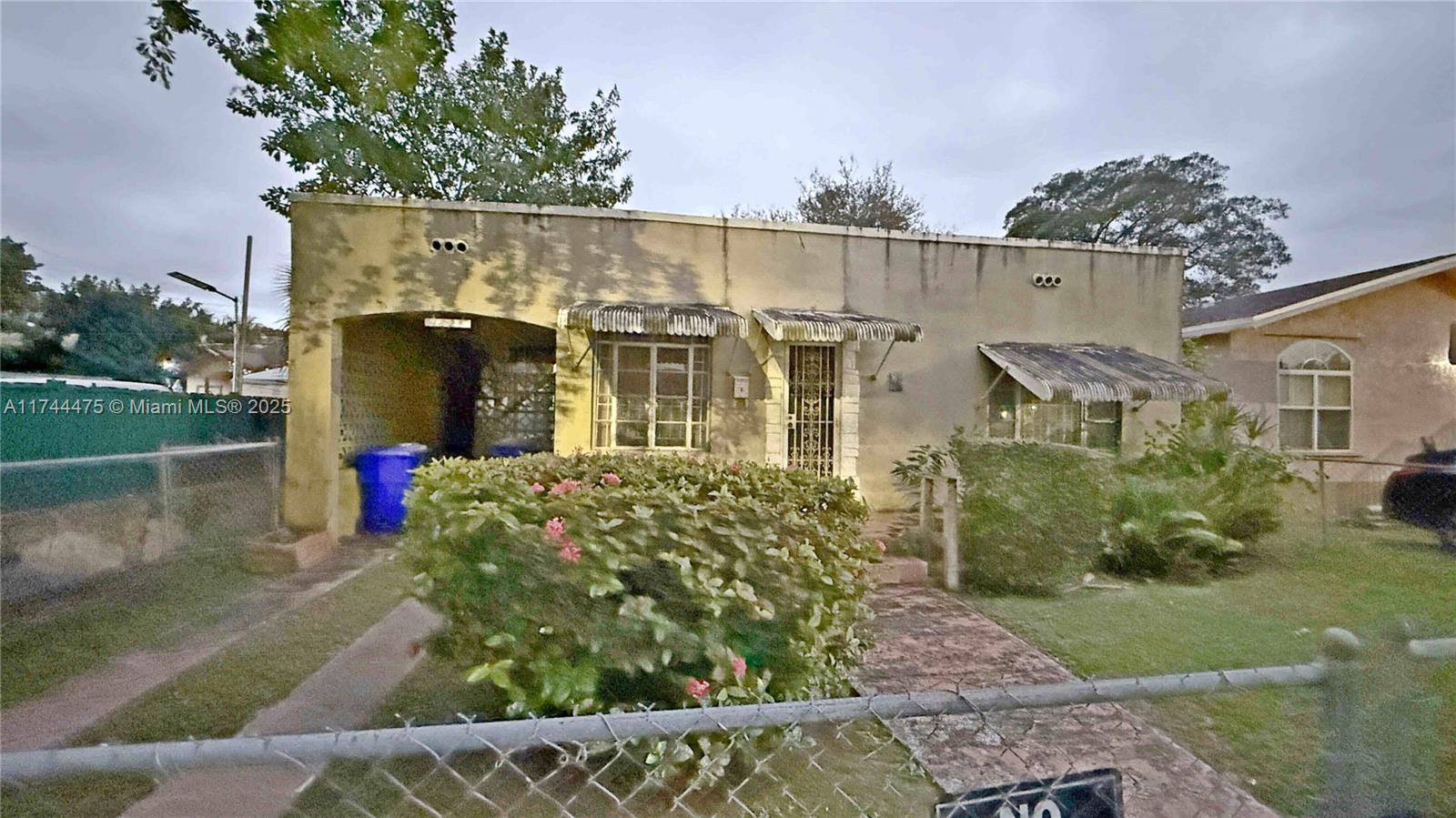 This quaint triplex, consisting of 2/1 front unit, carport and space for extra car in the  drive way. In the back: One ground level a 1/1. Upstairs another 1/1. Investors Special. Front unit needs a complete overhaul. Rear units need some work to bring them up-to-date. Best thing is do your inspections before making an offer. Open to all offers.