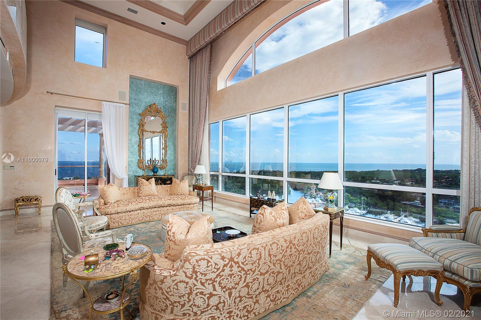 This stunning 6BR/6+1BA Tower Suite in Coral Gables is an Estate in the Sky offering 10,190 SF of luxury spanning 2 stories. Home features a private elevator, fine marble floors, Venetian plaster walls, crown moldings, a beauty area/massage room, a theater & a large library. The spacious great room boasts double high ceilings & walls of glass plus a private dining salon both w/amazing views. The eat-in gourmet kitchen sports top-of-the-line-appliances & has a separate breakfast area. An elegant 2nd floor principal suite w/double high ceiling, seating area & beautiful principal bathroom. 6 terraces provide endless views to Biscayne Bay, Miami Beach, Key Biscayne and to downtown Miami. Unit includes 6 parking spaces & a storage room. 5-star amenities complete this amazing offering.