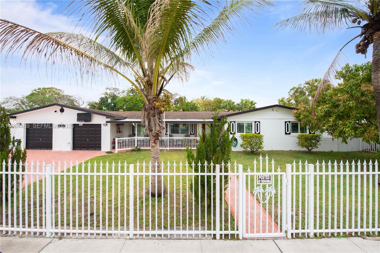 ** PRICE IMPROVEMENT ** Charming 3/2 home in Mowry Drive Estates offering spacious indoor and outdoor living. Inviting living room with tile floors, fan/light, drapes, and double doors for great natural light. Comfortable family room features built-in shelves, tile flooring, and fan/light—perfect for relaxing or entertaining. Kitchen includes black & white tile countertops, stainless steel refrigerator and stove, plus a convenient snack bar. Dining area with chandelier adds a warm touch for gatherings. Primary suite features tile flooring, fan/light, walk-in closet, and a private bath with one sink and walk-in shower. Secondary bedrooms offer tile floors, blinds, ceiling fans/lights, and ample closet space. Second bath also includes a walk-in shower and one sink. Spare room currently used as a movie room but could easily be converted into an office or in law quarters. Enjoy outdoor living with a covered/screened patio, outdoor kitchen, and plenty of space for entertaining. Property includes a swing set/playground, additional covered storage, and a large front patio. Fully fenced with electric gate for added privacy. Oversized 4-car garage with 3 doors and workbench provides excellent workspace and storage. PROOF OF FUNDS AND/OR PRE-APPROVAL LETTER REQUIRED PRIOR TO SCHEDULING A SHOWING OF THE PROPERTY!