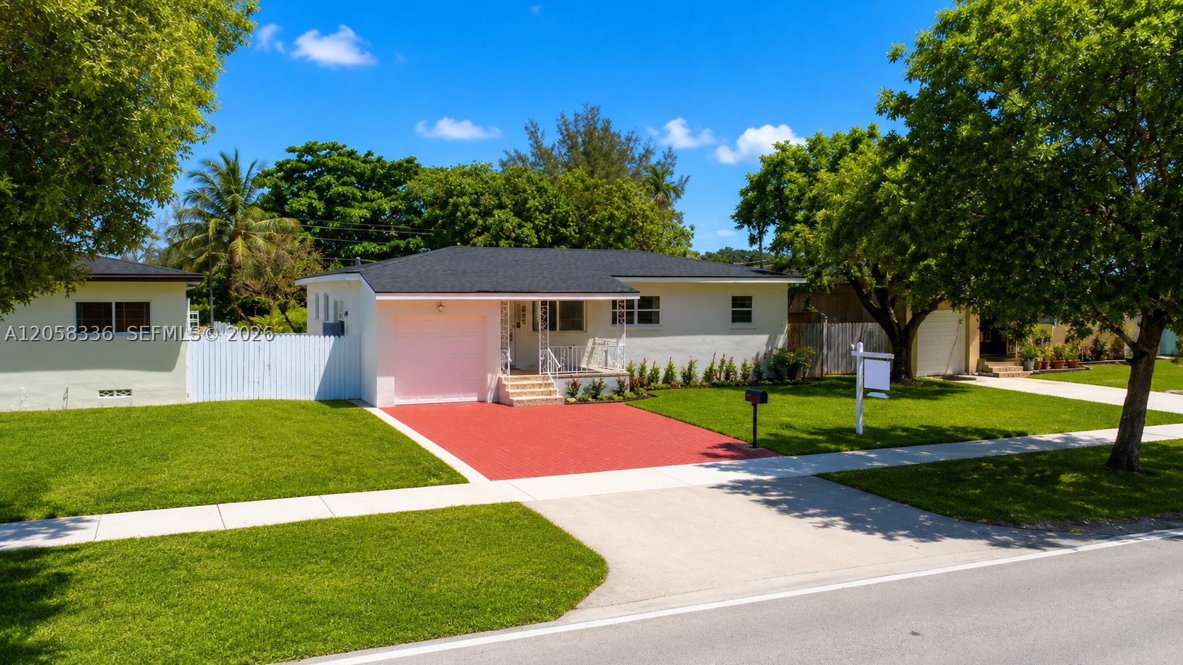 Beautifully renovated 3-bedroom, 3-bath waterfront home in the heart of Miami on an oversized approximately 9,450-square-foot lot with direct canal frontage and lake access. Offering nearly 2,000 square feet of living space, this move-in-ready home features a brand-new permitted roof, impact-resistant windows and doors, refinished wood floors, an updated interior, a one-car garage, and an oversized family room overlooking the canal. All renovations and improvements were completed with permits and approved plans, providing buyers with added peace of mind. The spacious backyard offers room for a pool, outdoor kitchen, or future expansion while enjoying the beauty of waterfront living. Conveniently located just 5 minutes from Miami International Airport, approximately 20 minutes to Downtown Miami and the Brickell Financial District, and 20 minutes to Downtown Coral Gables, with easy access to major expressways, shopping, dining, parks, and schools. A rare opportunity to own a beautifully updated waterfront home with lake access in one of Miami's most convenient and desirable neighborhoods.