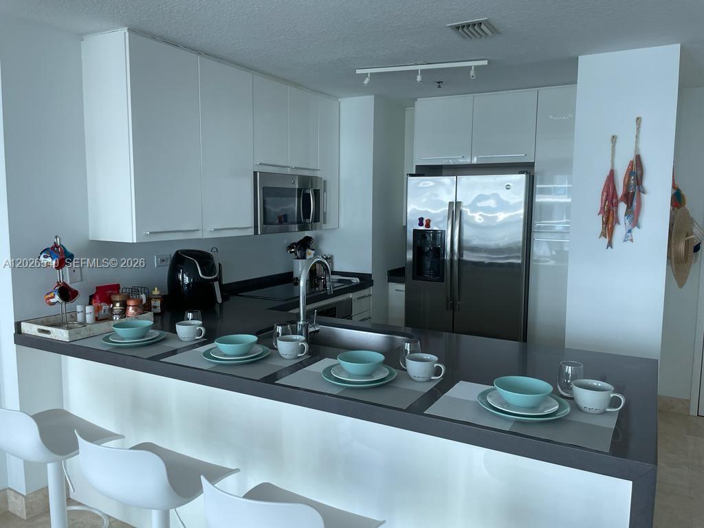 BEL-AIRE ON THE OCEAN CON - Residential Lease