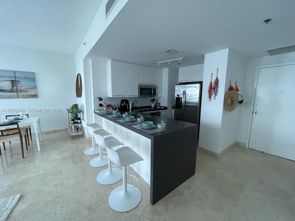 BEL-AIRE ON THE OCEAN CON - Residential Lease
