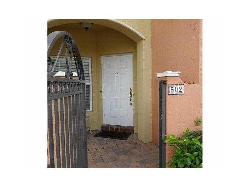 Beautiful townhome features 3 bedrooms, 2 1/2 baths with many designer upgrades. Open kitchen has espresso cabinetry & S/S appliances w/ breakfast area. This Sorrento model offers greatroom, familyroom or separate dining room-your preference!  Pre-wired w / surround sound, all canister lighting on dimmers, 5 ceiling fans and 4 flat screens all included. Master has deep tub, dbl shower heads & dual sinks. This home ENERGY Star