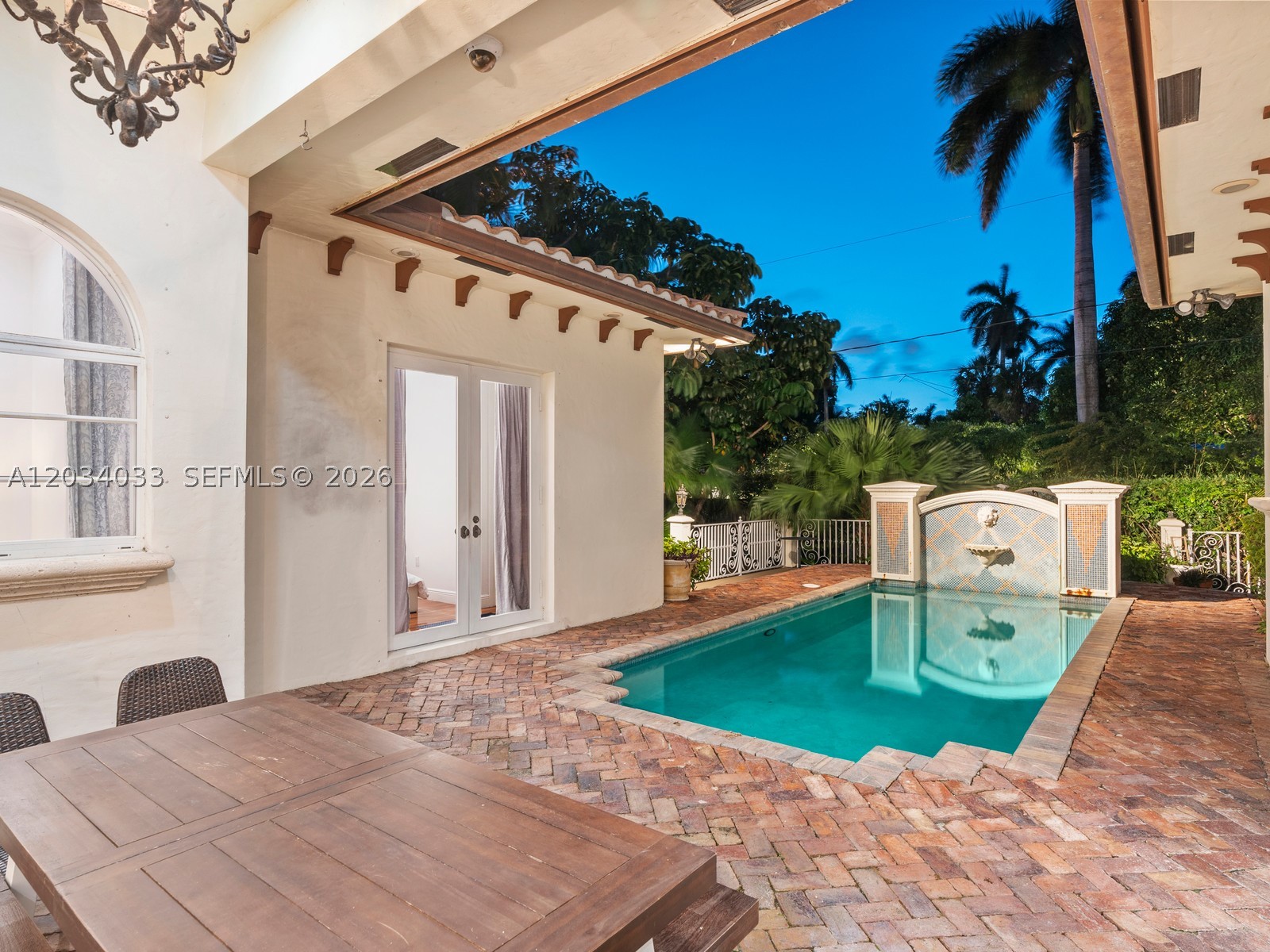 Exceptional rental opportunity with breathtaking views of South Lake and the Intracoastal Waterway! Located in the prestigious Hollywood Lakes neighborhood, this stunning Mediterranean-style residence offers luxury living in one of Hollywood’s most desirable locations.

Featuring 5 spacious bedrooms and 3 beautifully appointed bathrooms, this elegant home welcomes you with a grand foyer, soaring ceilings, and timeless architectural details throughout. Brazilian cherry wood flooring enhances the warmth and sophistication of the bedroom spaces, while expansive living areas provide the perfect setting for comfortable everyday living and entertaining.

The gourmet kitchen is thoughtfully designed with custom wood cabinetry, granite countertops, and premium stainless steel appliances — ideal for preparing meals and gathering with family and friends.

Step outside to your own private retreat featuring a heated pool with waterfall, beautifully paved patio, and serene South Lake views — perfect for relaxing or entertaining year-round. Ideally located just minutes from the beach, fine dining, shopping, parks, and vibrant downtown Hollywood, this home offers an incredible opportunity to enjoy the best of the South Florida lifestyle.