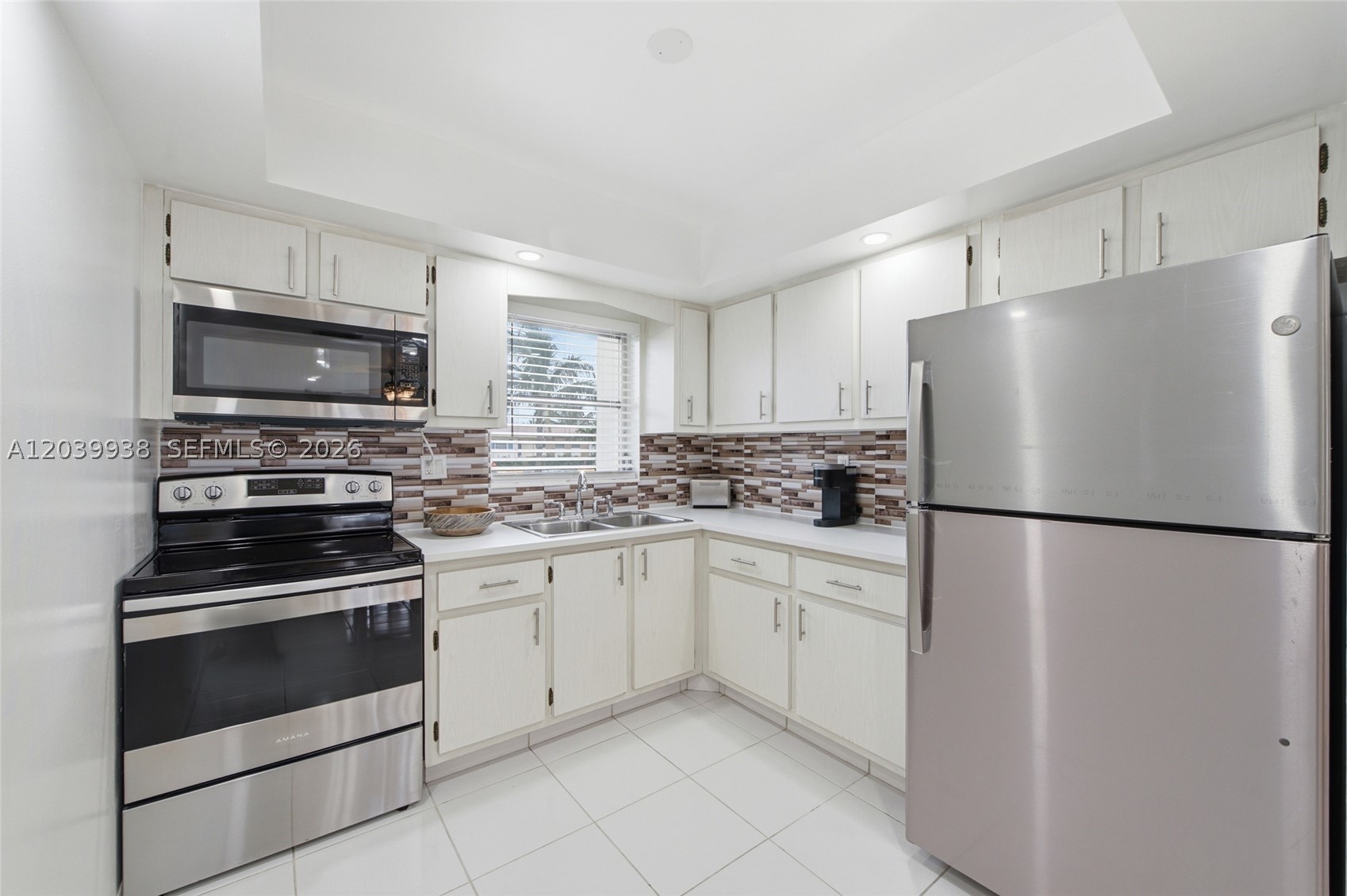 **GREAT OPPORTUNITY TO OWN THIS SPACIOUS FIRST FLOOR VILLAS** YOU'LL FEEL AT HOME THE MOMENT YOU WALK IN WITH IT'S UPDATED AND OPEN KITCHEN, CERAMIC TILES THRUOUT, REMODELED BATHROOMS AND MORE. **NEW ROOF, A/C UNIT METICULOUSLY MAINTAINED AND  CONDENSOR WAS RECENTLY REPLACED, NEW WATER HEATHER, HURRICANE SHUTTERS & MORE... BASICALLY DOESNT NEED ANYTHING**LOOKING FOR A SECOND RESIDENCE? NO PROBLEM AS THIS ONE CAN ALSO BE SOLD COMPLETELY FURNISHED SO YOU CAN MOVE RIGHT IN.****ENJOY A TOP OF THE LINE MAINTAINED COMPLEX AND ACTIVE COMMUNITY WITH VERY LOW AND AFFORDABLE MONTHLY FEES.** PS. NO LEASE FIRST YEAR THEN ONE RENTAL YEARLY UP TO A MAXIMUM OF 6 MONTHS.