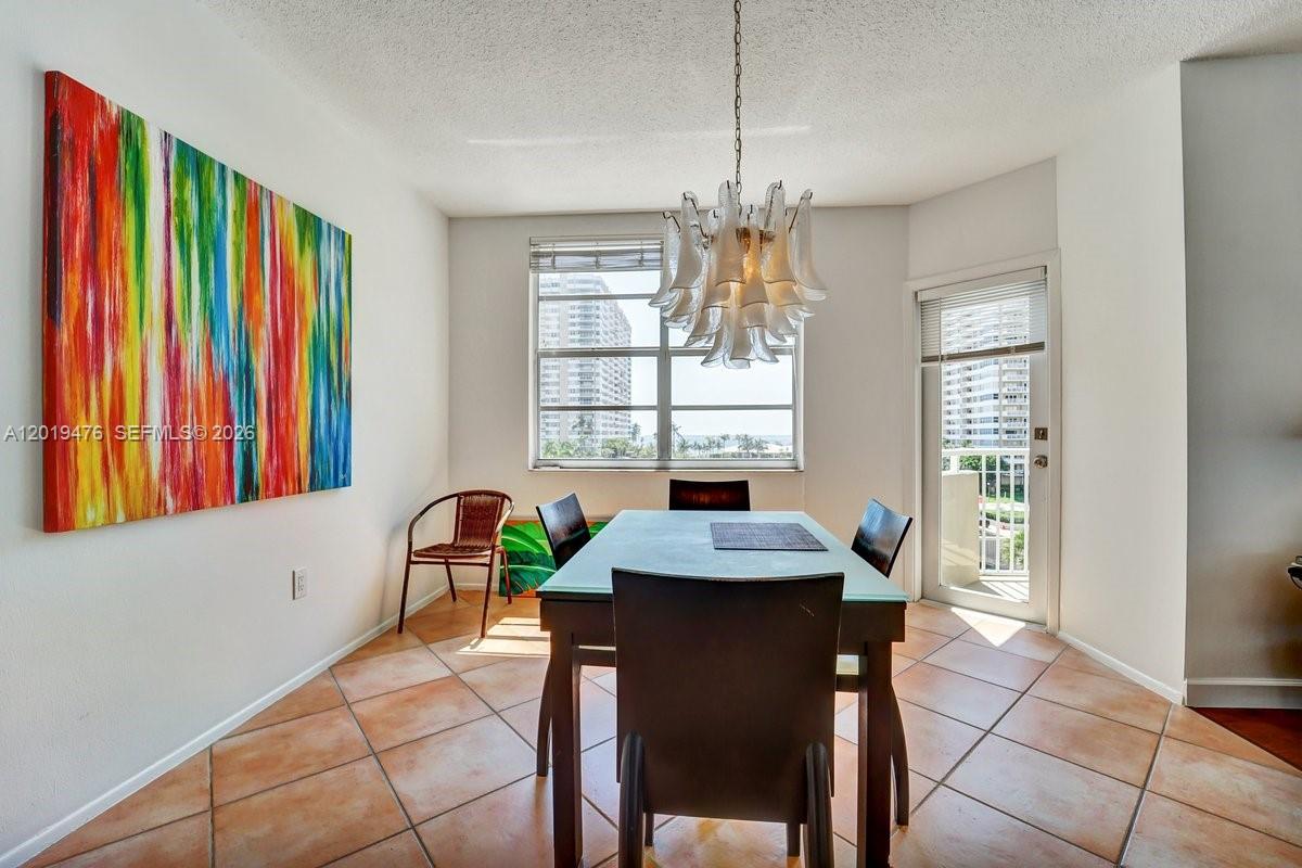 The Hemispheres Building. Bay North Build. Ample, bright corner unit with ocean view and a good view of the Intracoastal. Ceramic in the kitchen, dining, hallway, and baths, and wood floors in the living room, and quality laminated floors in the bedrooms. Storage on the floor, assigned 1 covered parking, and 1 additional parking for a small fee. Many amenities, including beach access & services, 2 heated pools, one over the ocean and one over the intracoastal, 2 tennis courts, gym, putting green, 2 mini-marts, basketball court, barbecue area, games rooms included, ping pong and others. 2 restaurants, 1 over the ocean, 1 over the Intracoastal, snack bars. Valet service. Maintenance includes A/C, internet, insurance, all amenities, heated pools services, pest control, TV Cable, common areas, laundry space/equipment, guest parking, Pest Control Interior, Hot water/water, security, sewer, trash removal. Seller will pay Spec Asses at closing. Text Listing Agent for Showings.