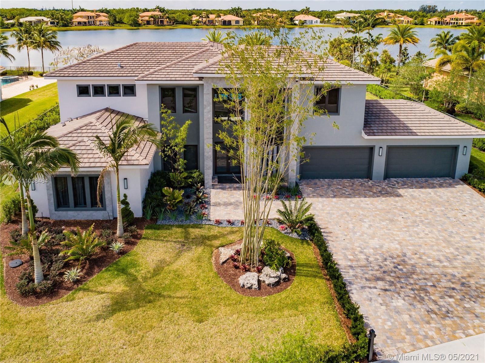Luxury, resort-style living awaits you in this immaculately-designed custom home. Nestled in the heart of the most prestigious community, the Windmill Reserve neighborhood is right where you want to be – completely gated and with 24-hour security. A brand-new home that has never before been occupied, this sprawling 6-bedroom, 7-bathroom home boasts 8,554 sq. ft. across two stories of intentionally designed living space that accounted for your every need to be met. 
The completely custom home was designed to impress and to bring in the warm natural light. Completely furnished by the renowned Adriana Hoyos Design Studio, it doesn’t get more move-in ready than this. Home is a completely automated smart home that allows you to control every feature to your liking and needed security level.
