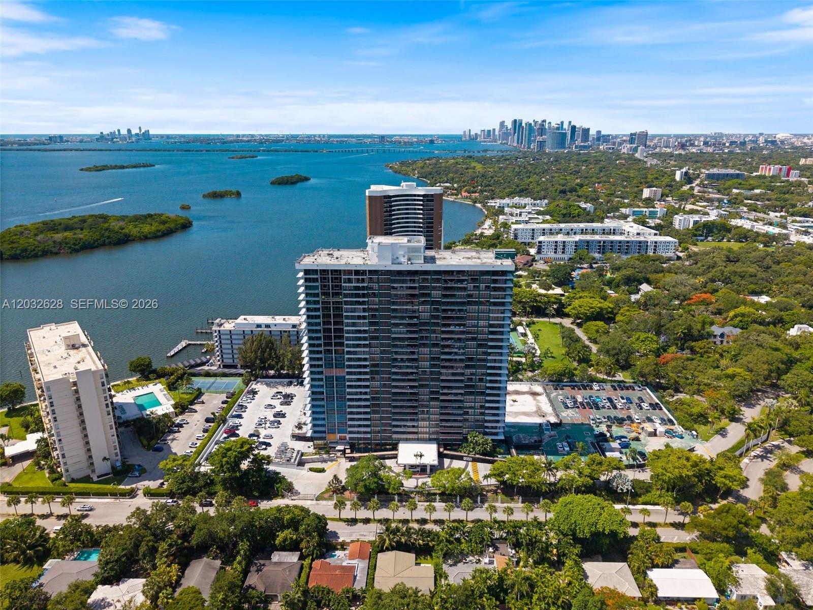 Experience some of the most beautiful views Miami has to offer from this 24th-floor waterfront residence. This 2-bedroom, 2-bathroom condo showcases unobstructed views stretching across Biscayne Bay, North Bay Village, and beyond, creating a stunning backdrop from sunrise to sunset. Perfectly positioned in an incredible location, this home offers the lifestyle buyers dream about—endless water views, refreshing bay breezes, and convenient access to Miami’s most sought-after destinations. Enjoy being just 10 minutes from the Miami Design District, 15 minutes from Miami International Airport, and less than 15 minutes from the world famous beaches, restaurants, and nightlife of Miami Beach. The building is currently undergoing its 40-year recertification, with completion expected in July 2027. Owners will benefit from significant upgrades including floor-to-ceiling impact windows, brand-new balconies with sleek glass railings, a completely renovated pool and lounge area, tennis courts with pickleball striping, and a new BBQ pavilion designed for relaxing and entertaining. This presents a unique opportunity to purchase before these transformative improvements are completed. As the building enters its next chapter with modernized amenities and updated infrastructure, future owners will be well-positioned to enjoy both the enhanced lifestyle and potential long-term value. Schedule your private showing today!