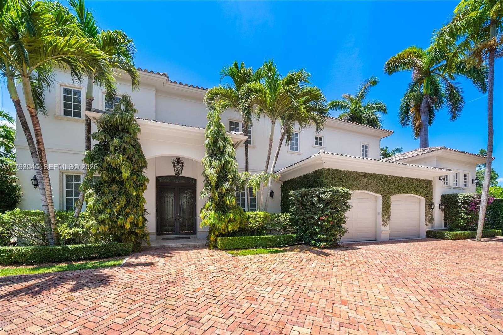 Located in the prestigious, guard-gated community of Cocoplum, this elegant 5-bed, 6.5-bath residence offers timeless luxury and modern comfort on an expansive 18,295 sq ft lot. With over 5,100 sq ft of living space, this home features a grand foyer, marble floors, a gourmet chef’s kitchen, formal living and dining rooms, and a spacious family room. Enjoy seamless indoor-outdoor living with a private backyard oasis, resort-style pool, covered terrace, and lush landscaping. The 3-car garage, impact windows, and proximity to top schools and Coconut Grove complete this exceptional offering.