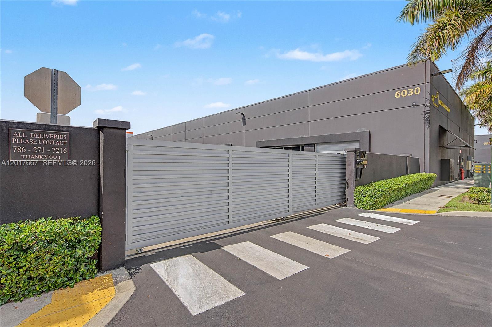 Introducing Suite 205 at CollectionSuites, an exclusive 2,449 SF end-unit private flex suite in the Indianapolis Building — one of only 38 ownership opportunities within Doral's premier collector's enclave. Far more than storage, Suite 205 is a gallery-like showroom purpose-built to safeguard and showcase the modern collector's most prized possessions, whether a curated art collection, exotic automobiles, a sophisticated wine cellar, or all of the above. The polished interior features a kitchen wet bar, full bathroom, closet, and mezzanine level, with soaring 24-foot ceilings that leave room for car lifts or expansion of the existing mezzanine to increase usable square footage. Every system is fully automated through a smart app including garage door, lighting, climate, sound, and in-suite security cameras putting real-time control of the entire suite at the owner's fingertips. The four-building complex is fully gated, with privacy and security paramount at every turn. Ownership includes access to the VIP Concierge Network plus the new private clubhouse coming as part of the CollectionSuites 2.0 expansion, an exclusive amenity available only to owners along with catering, event access, vehicle detailing, gas delivery, and dedicated transfer services. Ideally located in Doral: 10 minutes to Miami International Airport, 20 to Downtown Miami, and minutes from Coral Gables, Brickell, and Miami Beach.