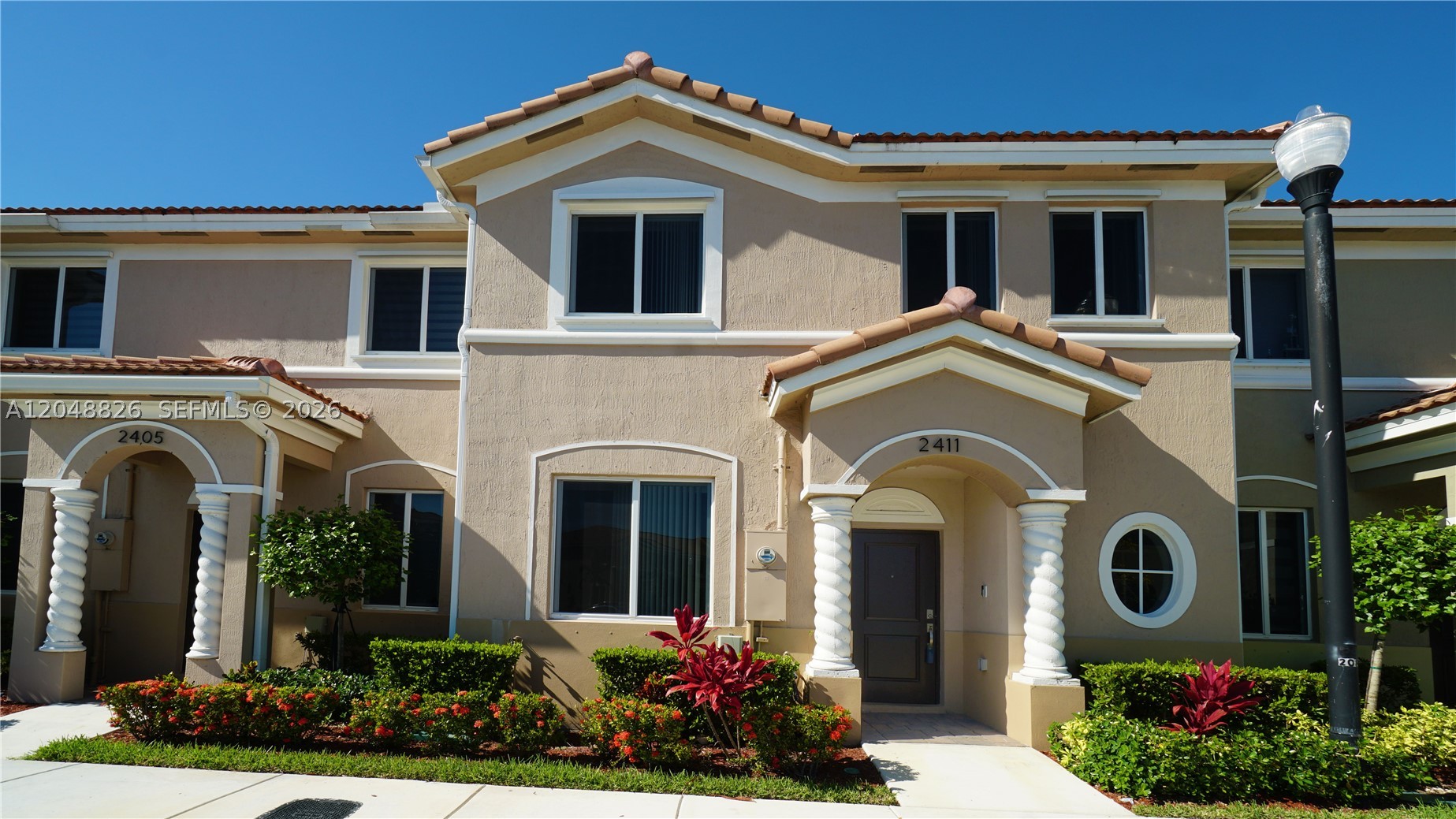 Stunning contemporary townhouse offering 4 spacious bedrooms and 3 full bathrooms. The bright, open-concept main level is flooded with natural light and features a modern kitchen complete with a central island, stainless steel appliances, and abundant cabinet storage. Ideal for guests or a home office, the floor plan includes a highly desirable downstairs bedroom and a full bathroom. Enjoy resort-style living in a premier community featuring excellent amenities and 24-hour secured entry. Perfectly situated just minutes from vibrant shopping, dining, and major roadways. Modern living at its finest