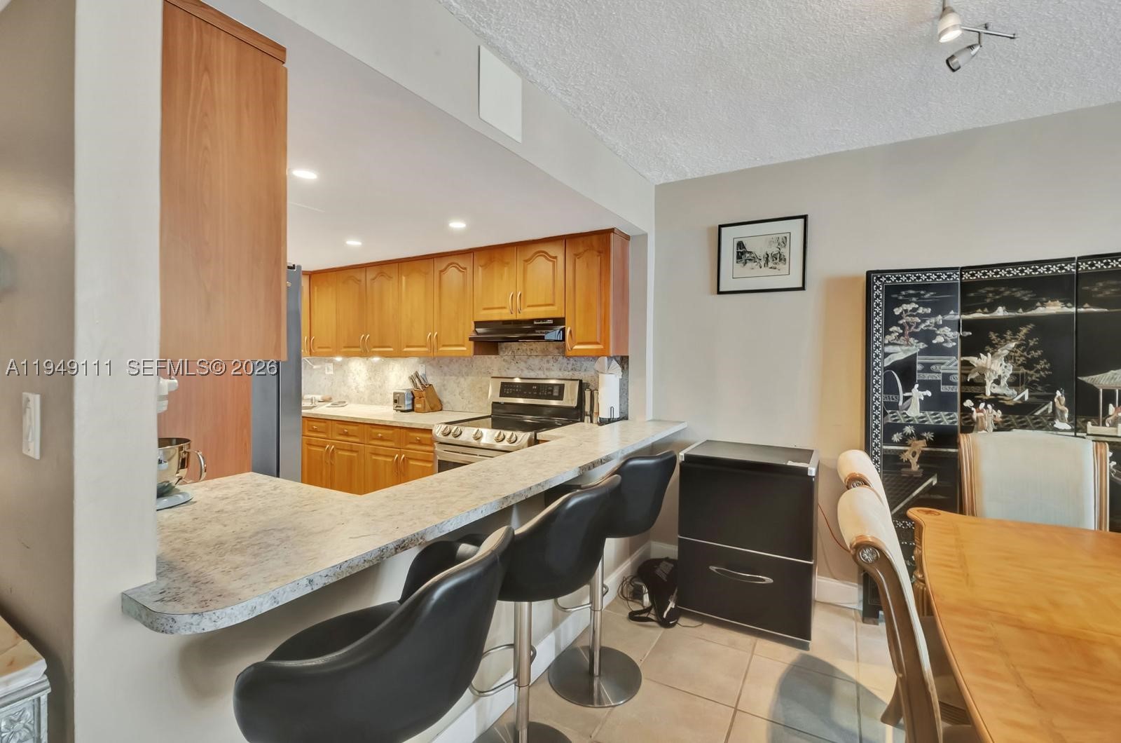 THE CARRIAGE HOUSE CONDO - Residential