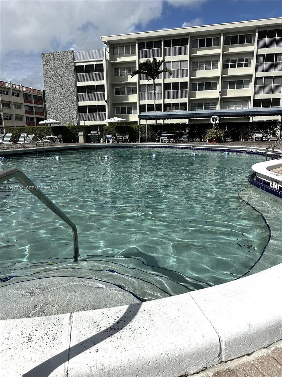 Location, Location, Location! Available unfurnished 1-bedroom, 1.5-bath condo located just across the street from The Village at Gulfstream Park in Hallandale Beach. Close to shopping, dining, and the beach. The unit features stainless steel appliances, and ceramic tile flooring throughout. Plenty of storage and comfortable living areas. 1 parking space included, and gust parking available. The building includes a secured lobby, community laundry facilities. Great amenities to include a large pool, picnic area with BBQ, and clubhouse. 55+ community — at least one resident must be 55 or older.