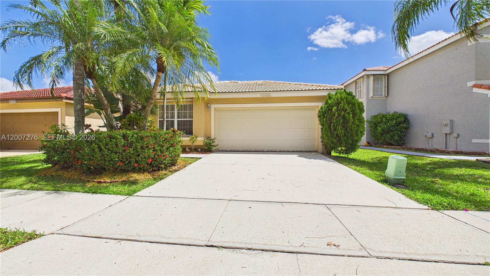 Beautiful 3BD/2BA single-family home in highly sought-after Silver Lakes! This light-filled home features an open layout with tile flooring throughout, updated kitchen with granite countertops, stainless steel appliances, and breakfast bar overlooking the main living areas. Spacious primary suite with walk-in closet. Enjoy a private fenced backyard with paved patio, perfect for relaxing or entertaining. Well-maintained with a 2-car garage and great curb appeal. New A/C (2021). Walking distance to community pool plus access to exclusive Silver Lakes Community Park with resort-style pool, beach area, volleyball, playground, and more. Low inventory area near top-rated A schools, parks, shopping, and major highways. Low HOA paid quarterly.